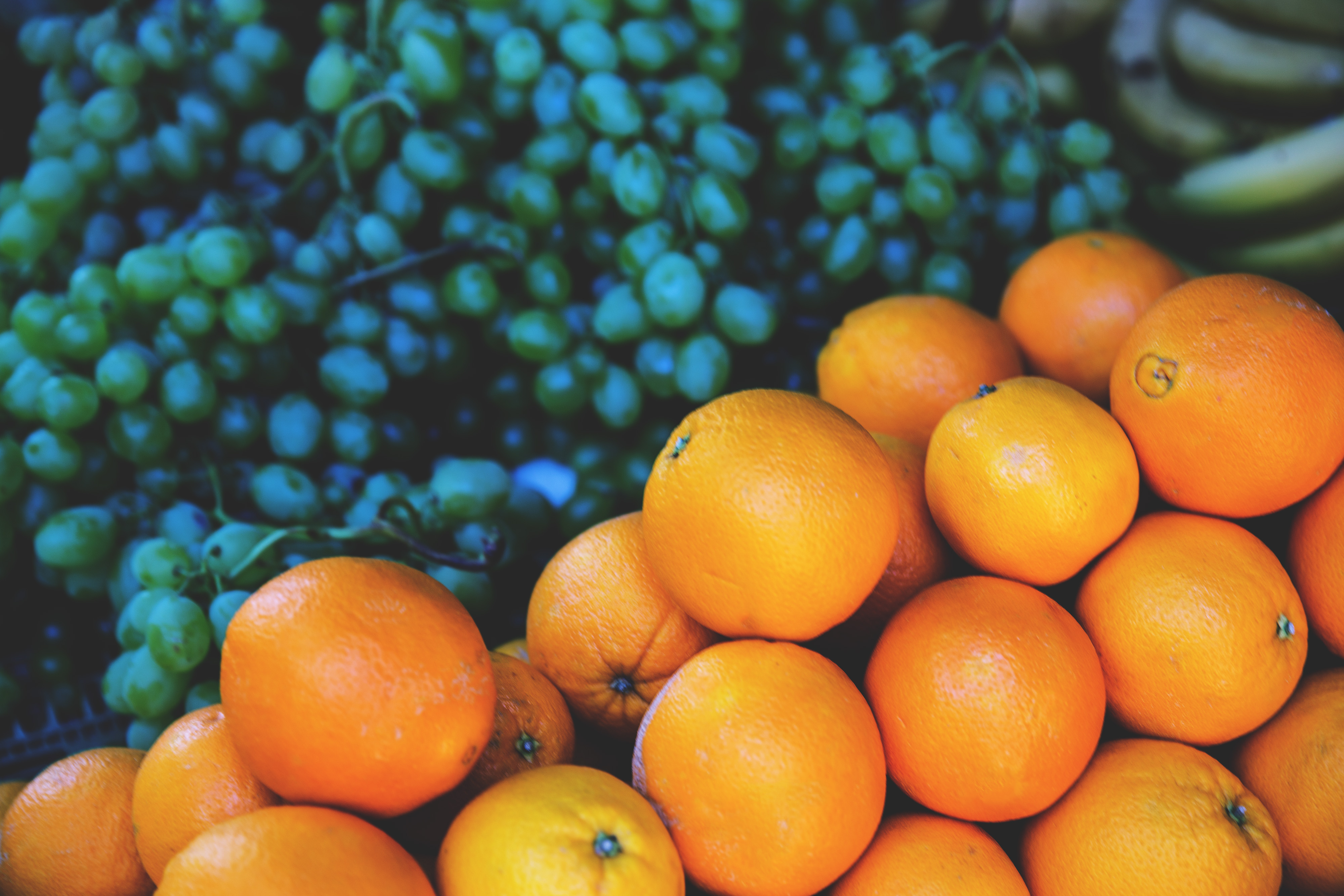 Download mobile wallpaper Oranges, Food, Grapes, Fruits for free.