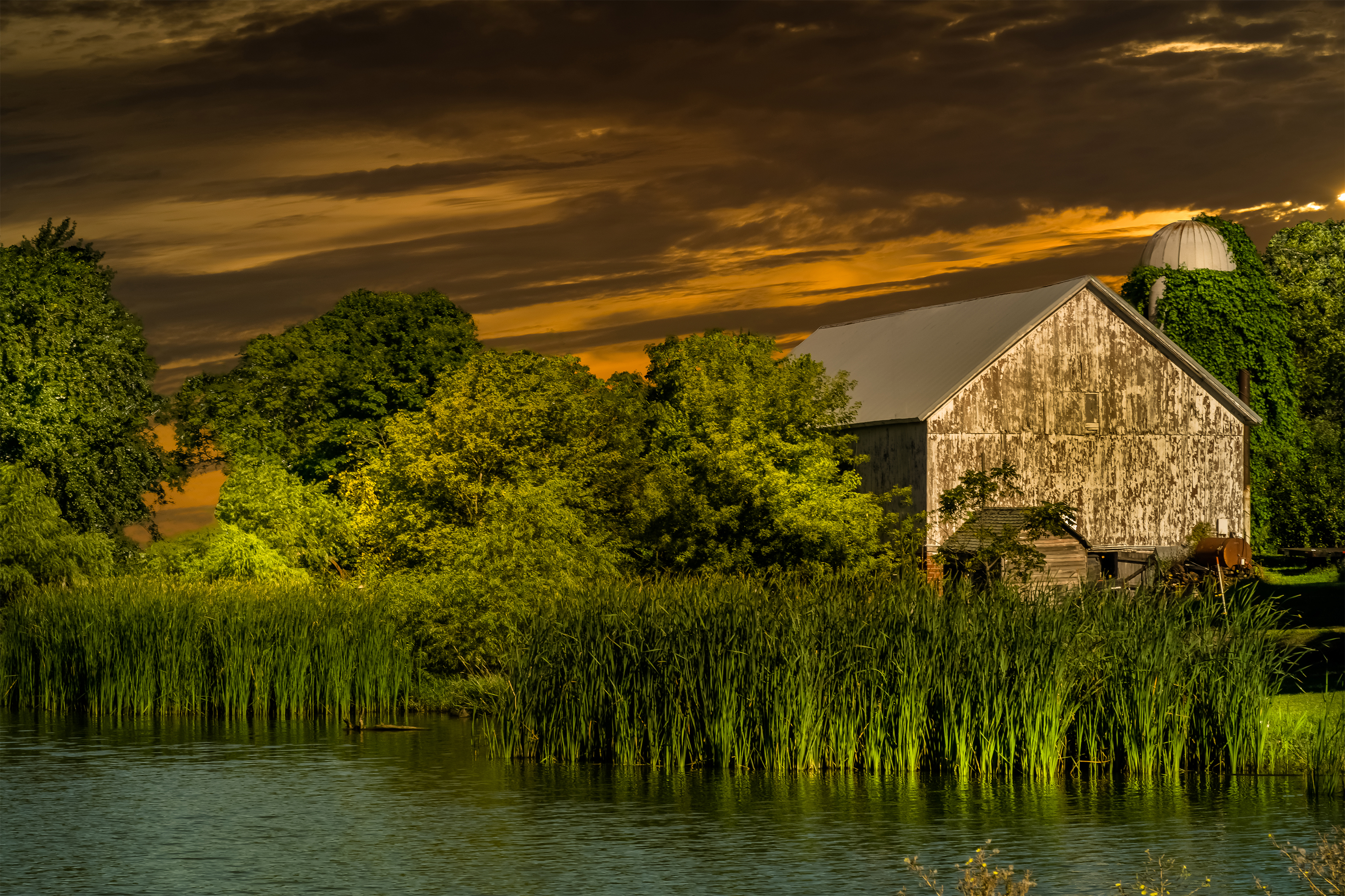 man made, barn, farm, green, river, sky, sunset