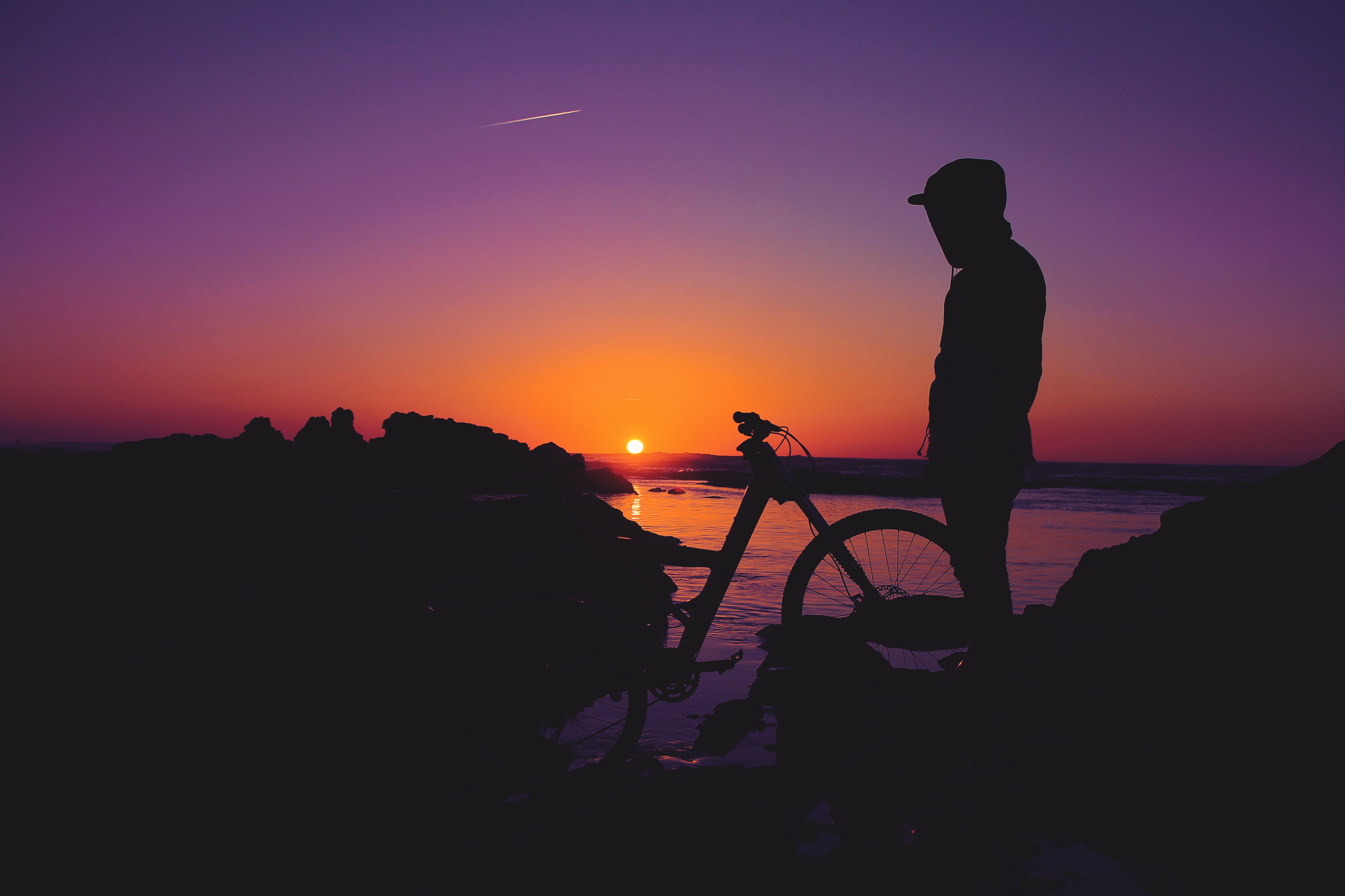 Download mobile wallpaper Sunset, Person, Human, Bicycle, Dark, Silhouette for free.