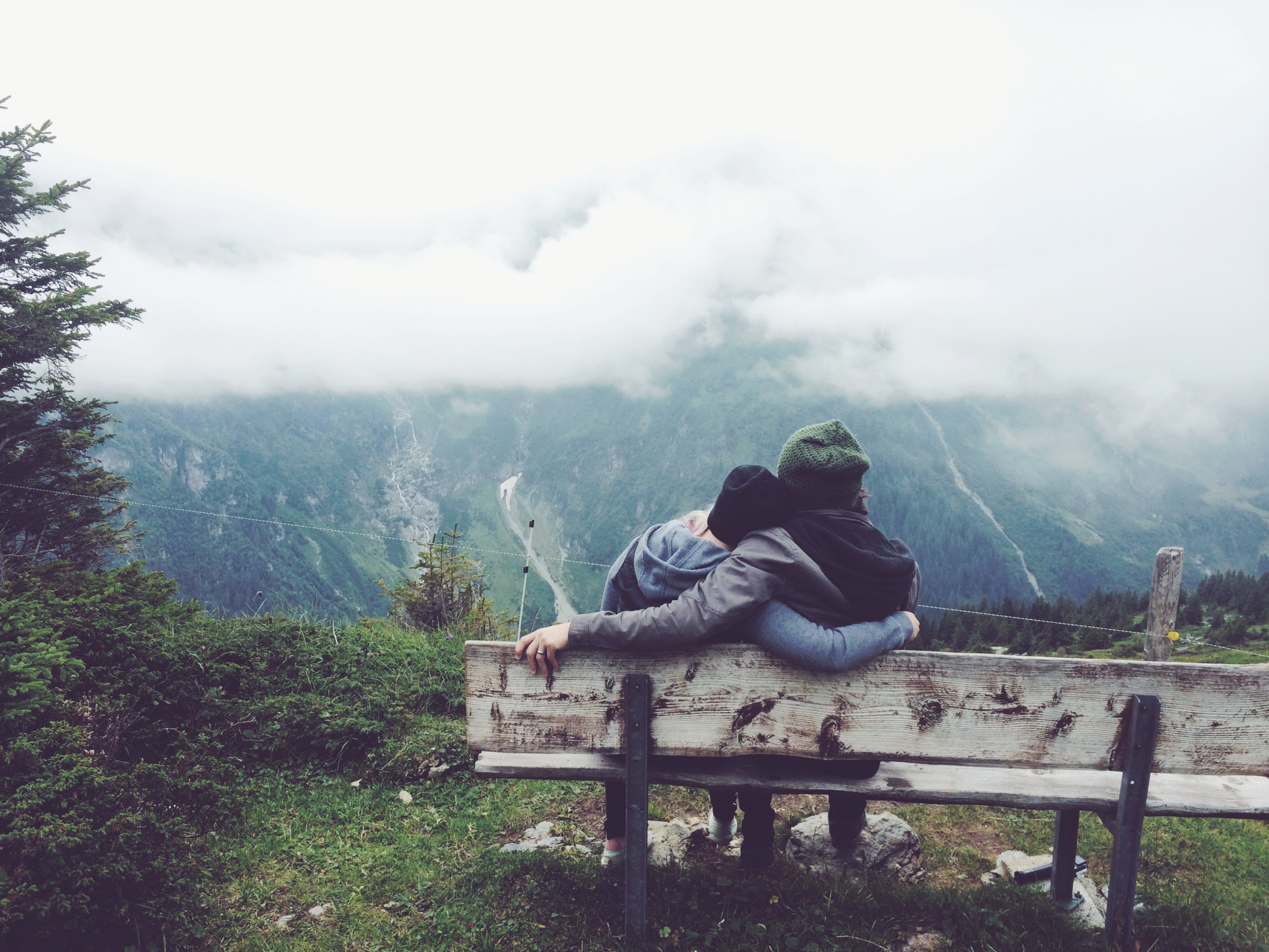 Download mobile wallpaper Couple, Mountains, Bench, Pair, Love, Embrace for free.