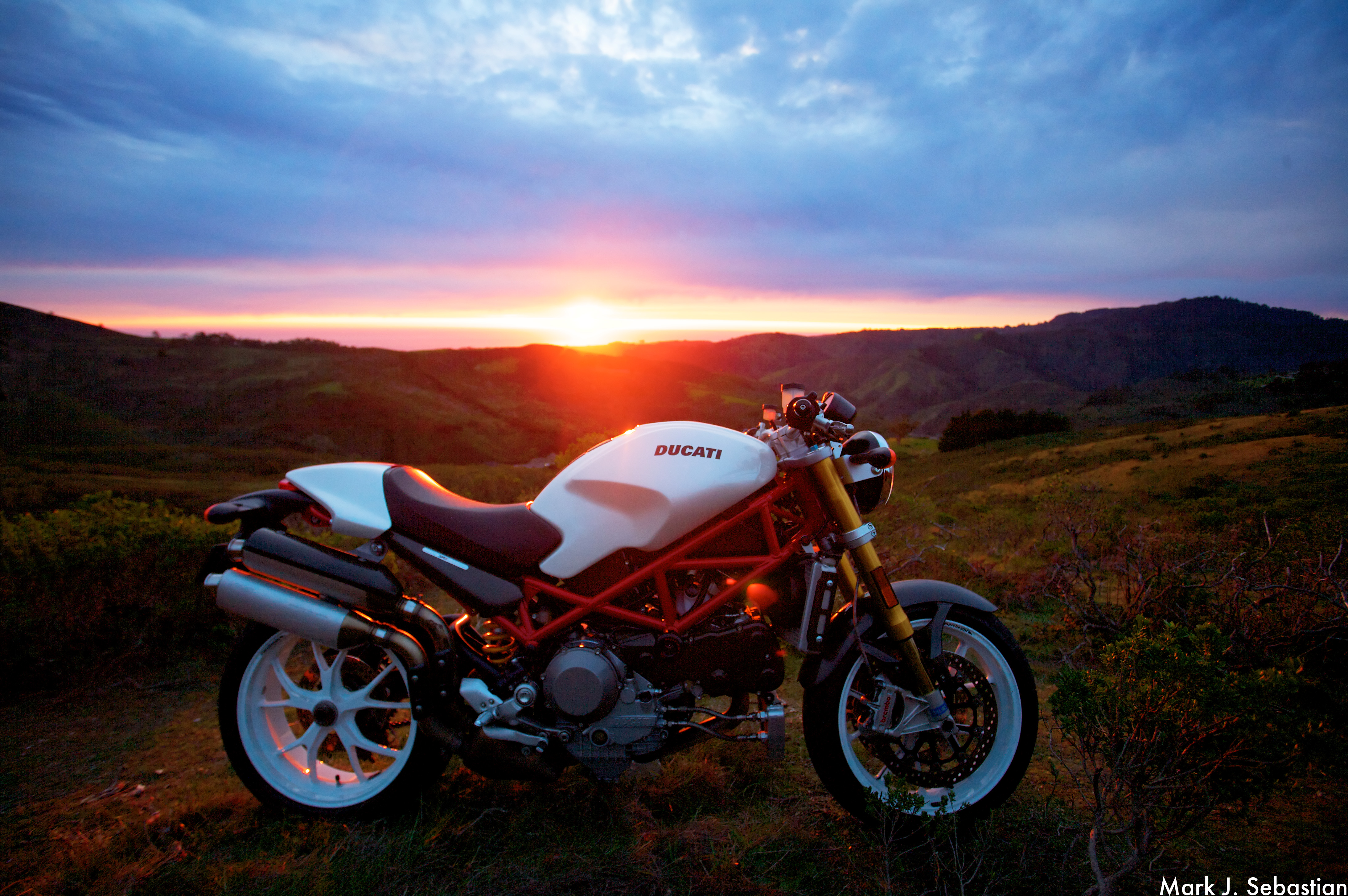 Download mobile wallpaper Sunlight, Motorcycles, Sunset, Motorcycle, Ducati for free.