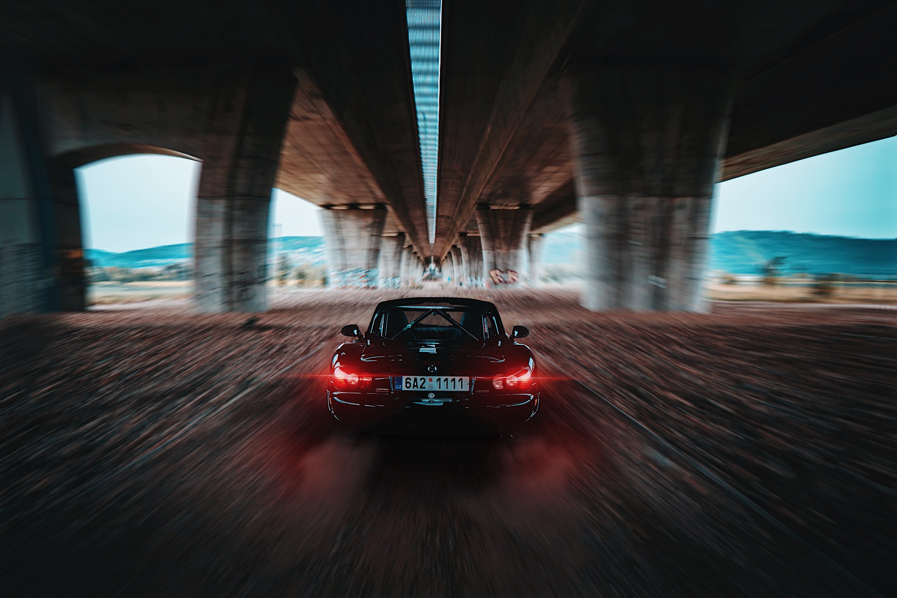 Download mobile wallpaper Mazda Mx5, Movement, Traffic, Mazda, Speed, Cars, Back View, Rear View, Sports, Sports Car for free.