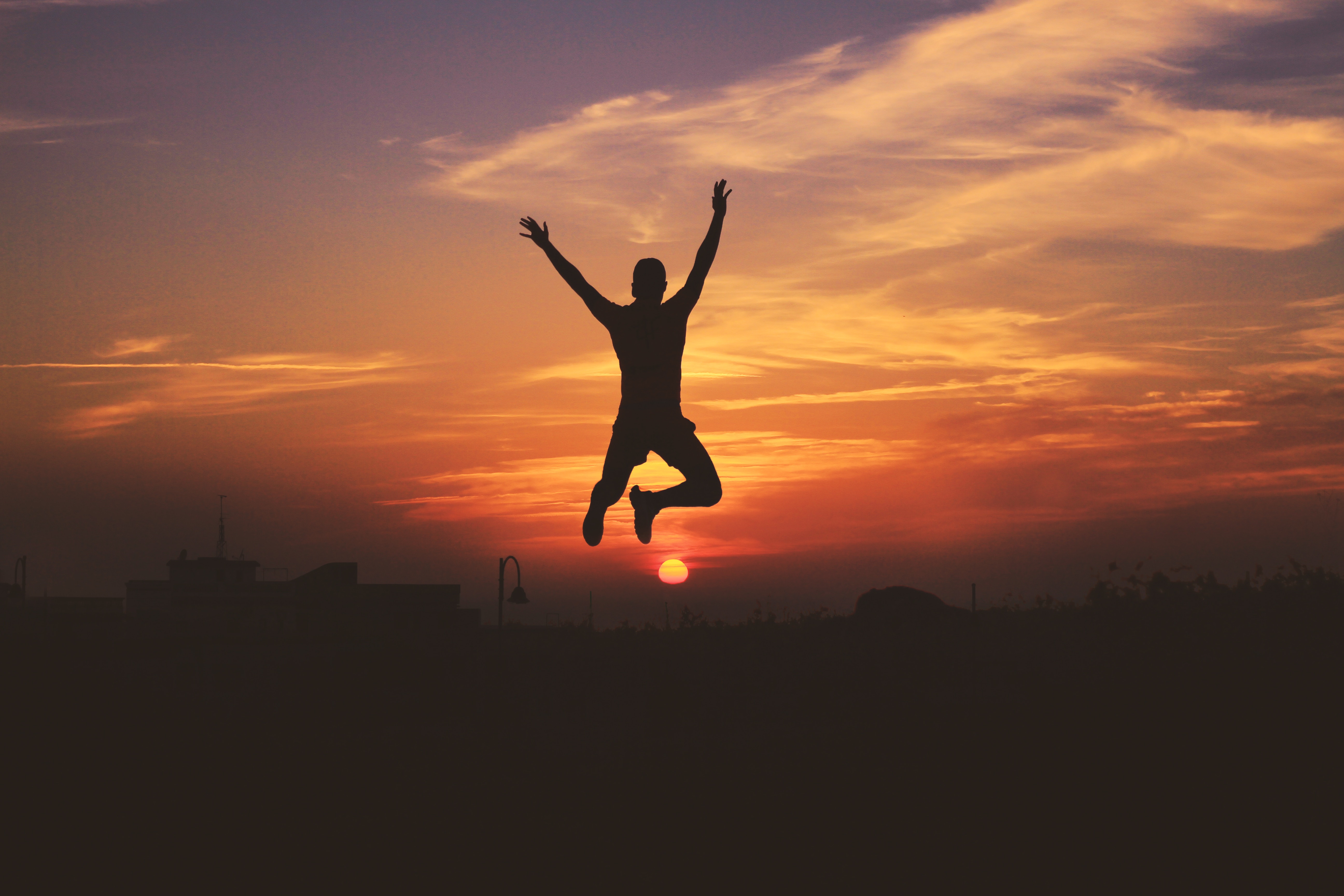 Download mobile wallpaper Jump, Bounce, Sky, Person, Sunset, Silhouette, Human, Dark for free.