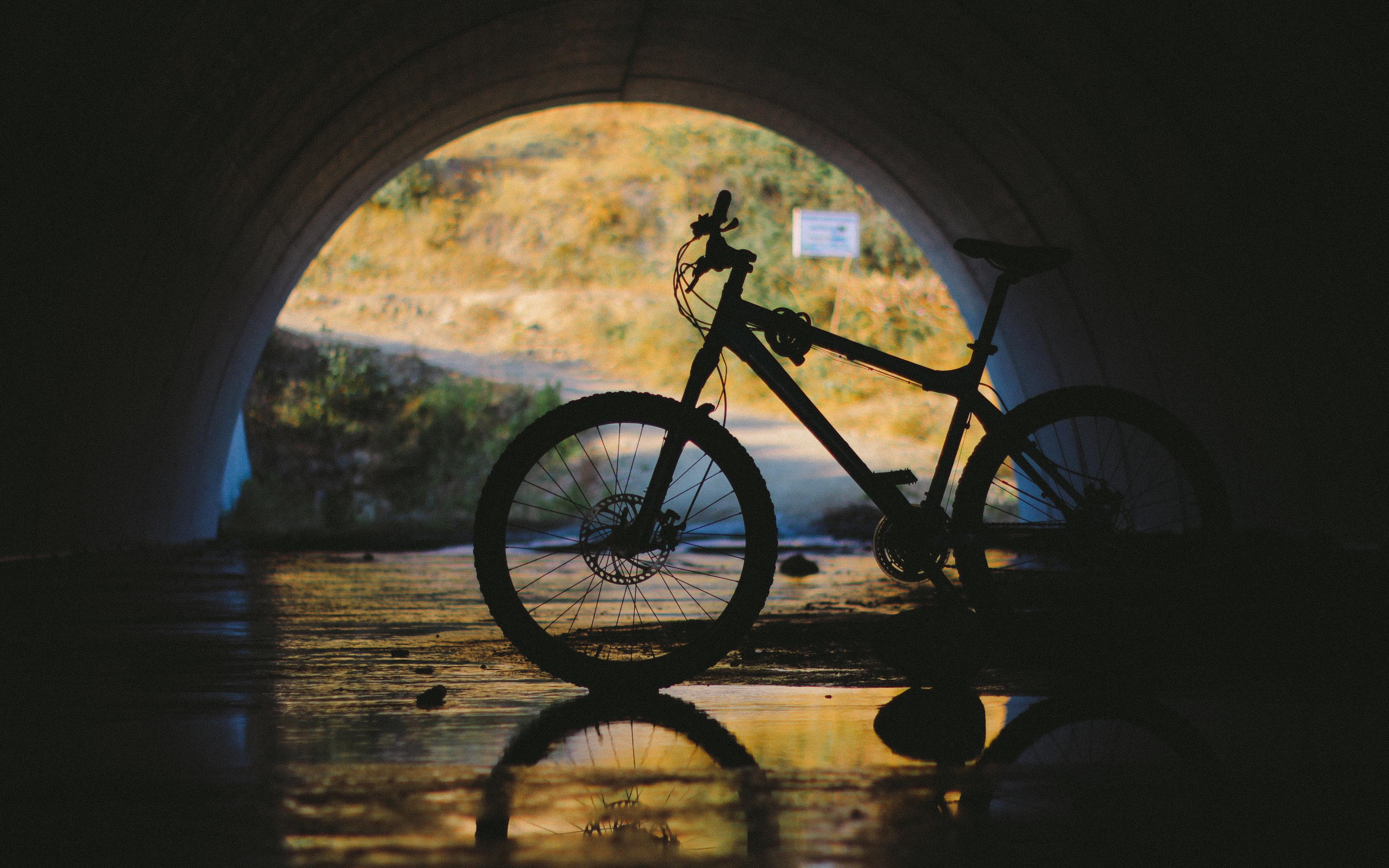 Download mobile wallpaper Bicycle, Reflection, Tunnel, Water, Underground, Dark for free.