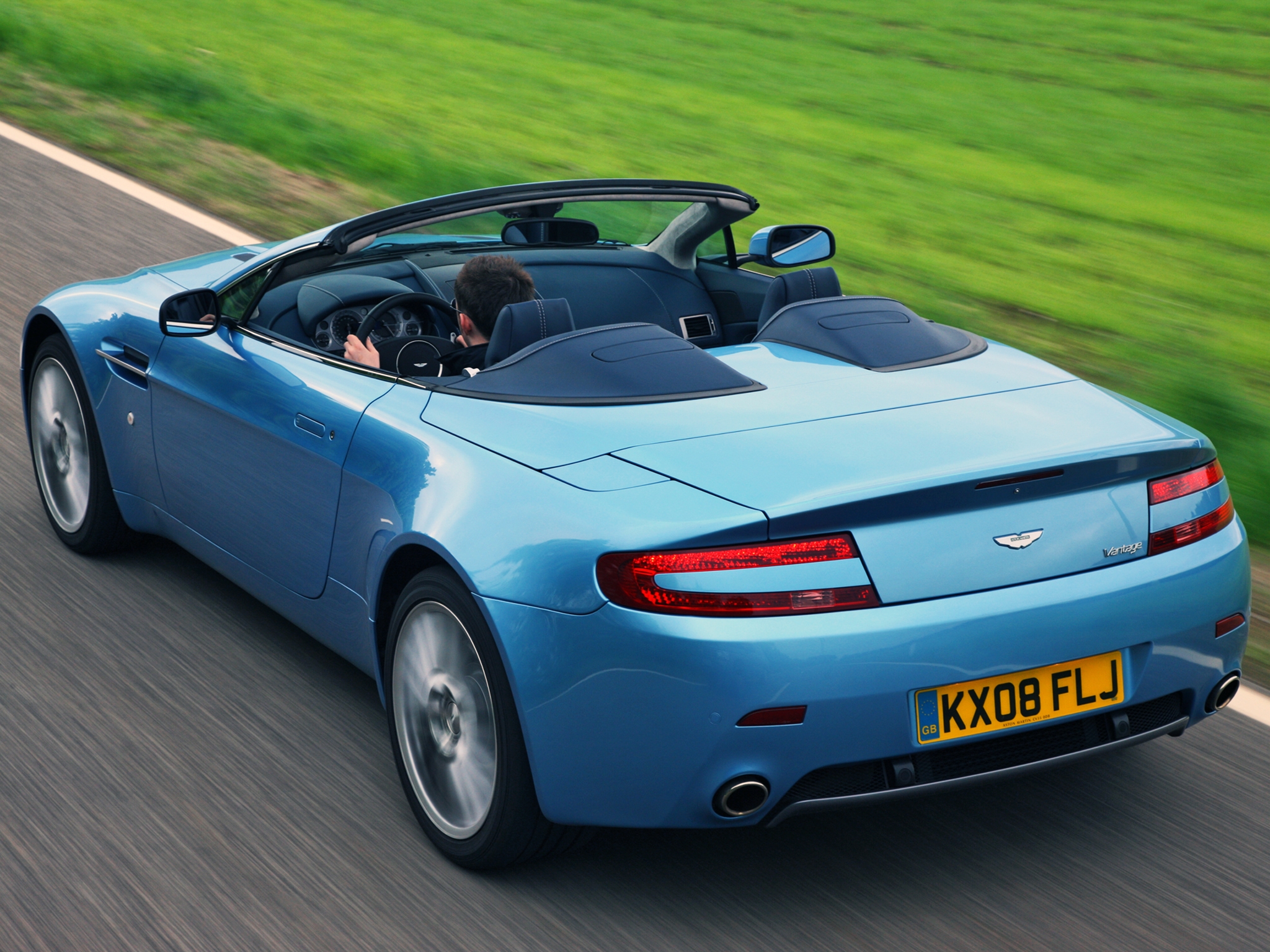 New Lock Screen Wallpapers back view, aston martin, cars, blue, rear view, speed, style, 2008, v8, vantage