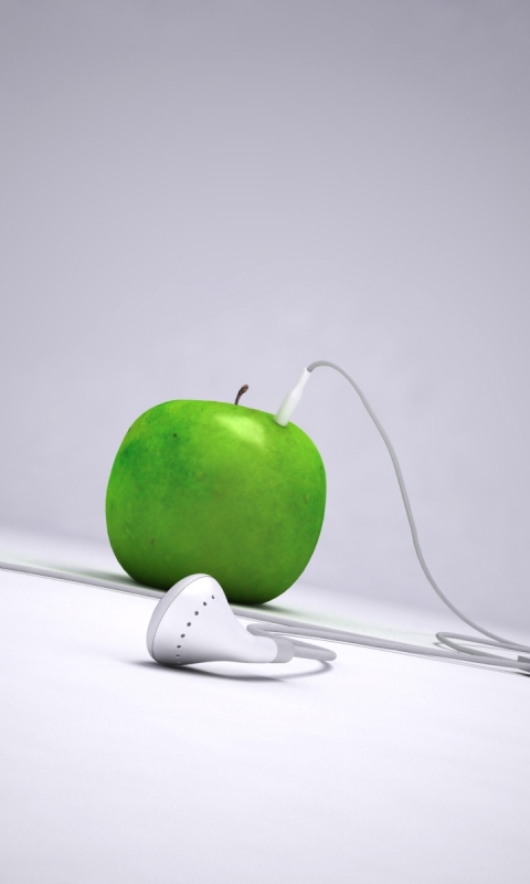 Earbuds on Laptop · Free Stock Photo