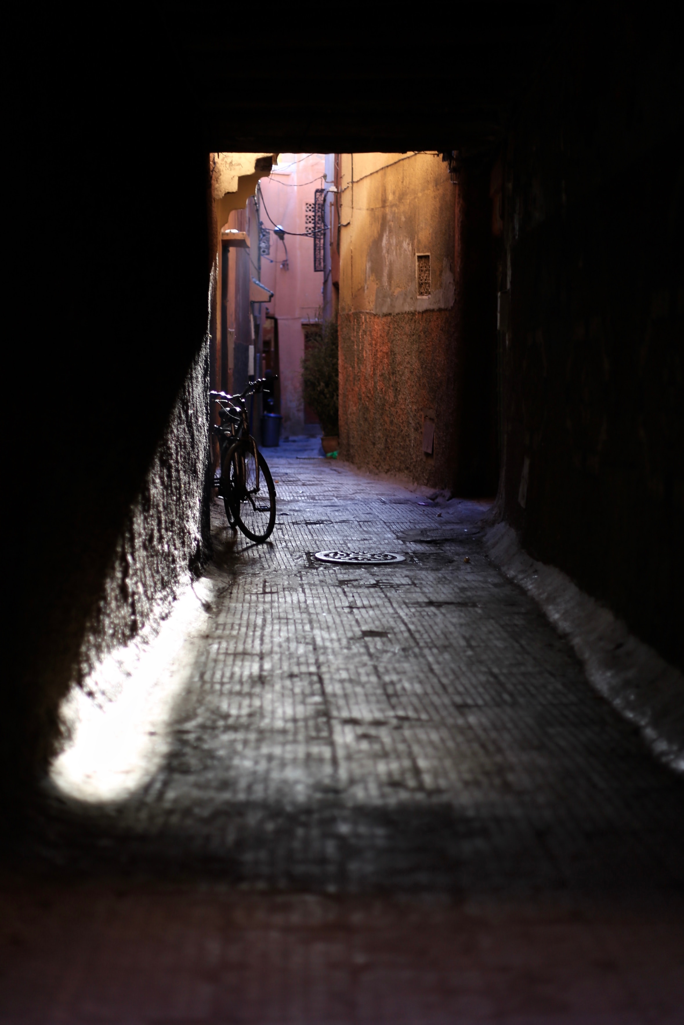 Download mobile wallpaper Lane, Tunnel, Shine, Light, Bicycle, Dark for free.