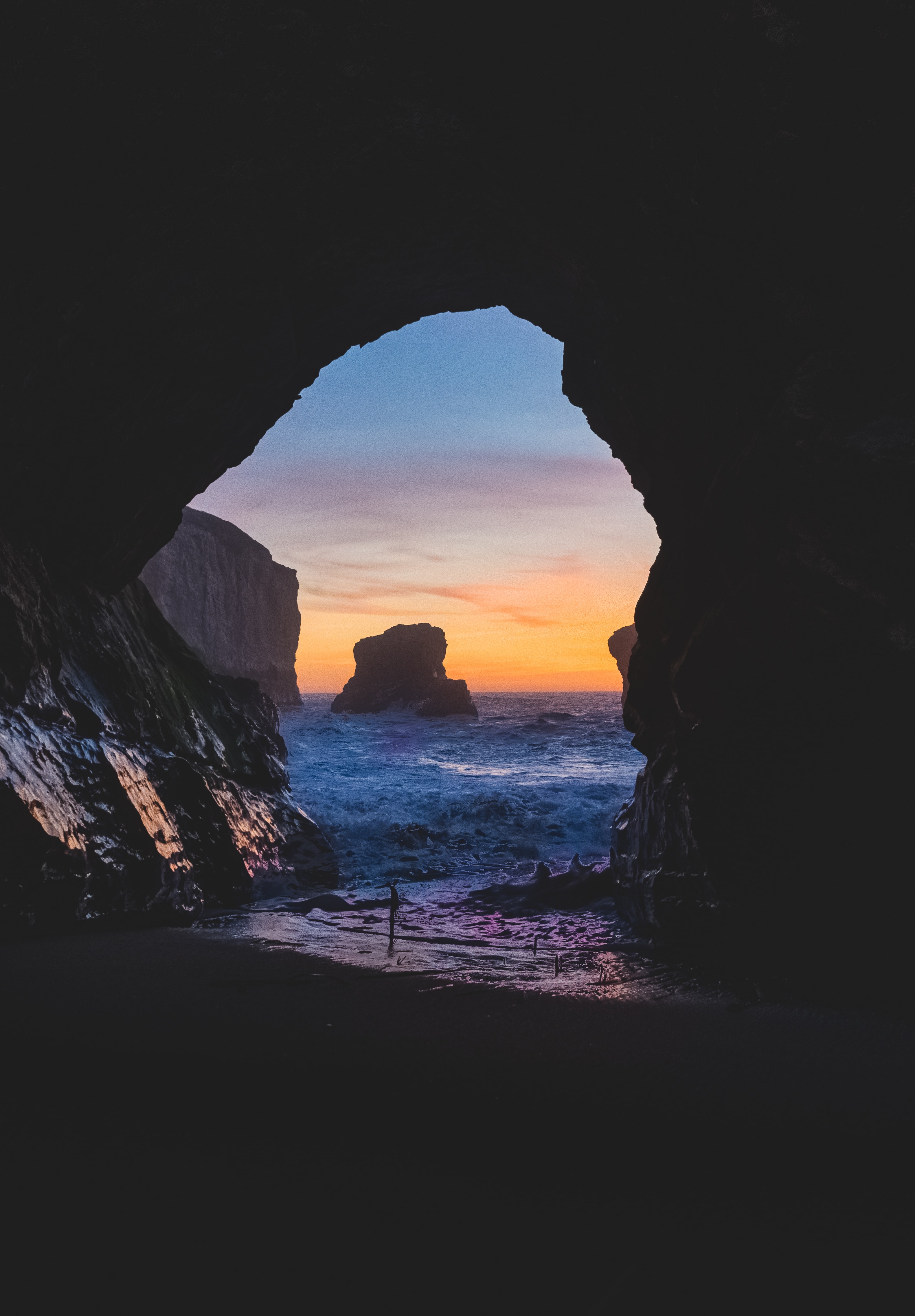Download mobile wallpaper Rocks, Nature, Sunset, Sea, Cave for free.