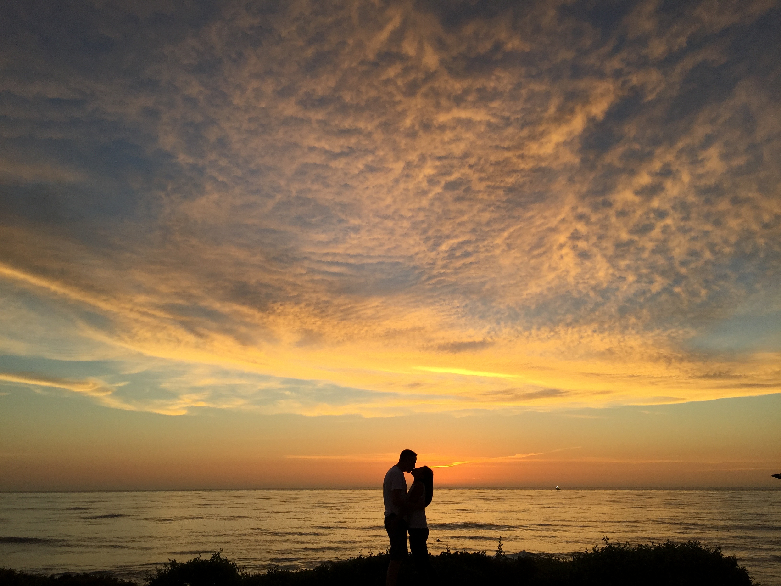 Download mobile wallpaper Nature, Sunset, Pair, Romance, Kiss, Couple for free.