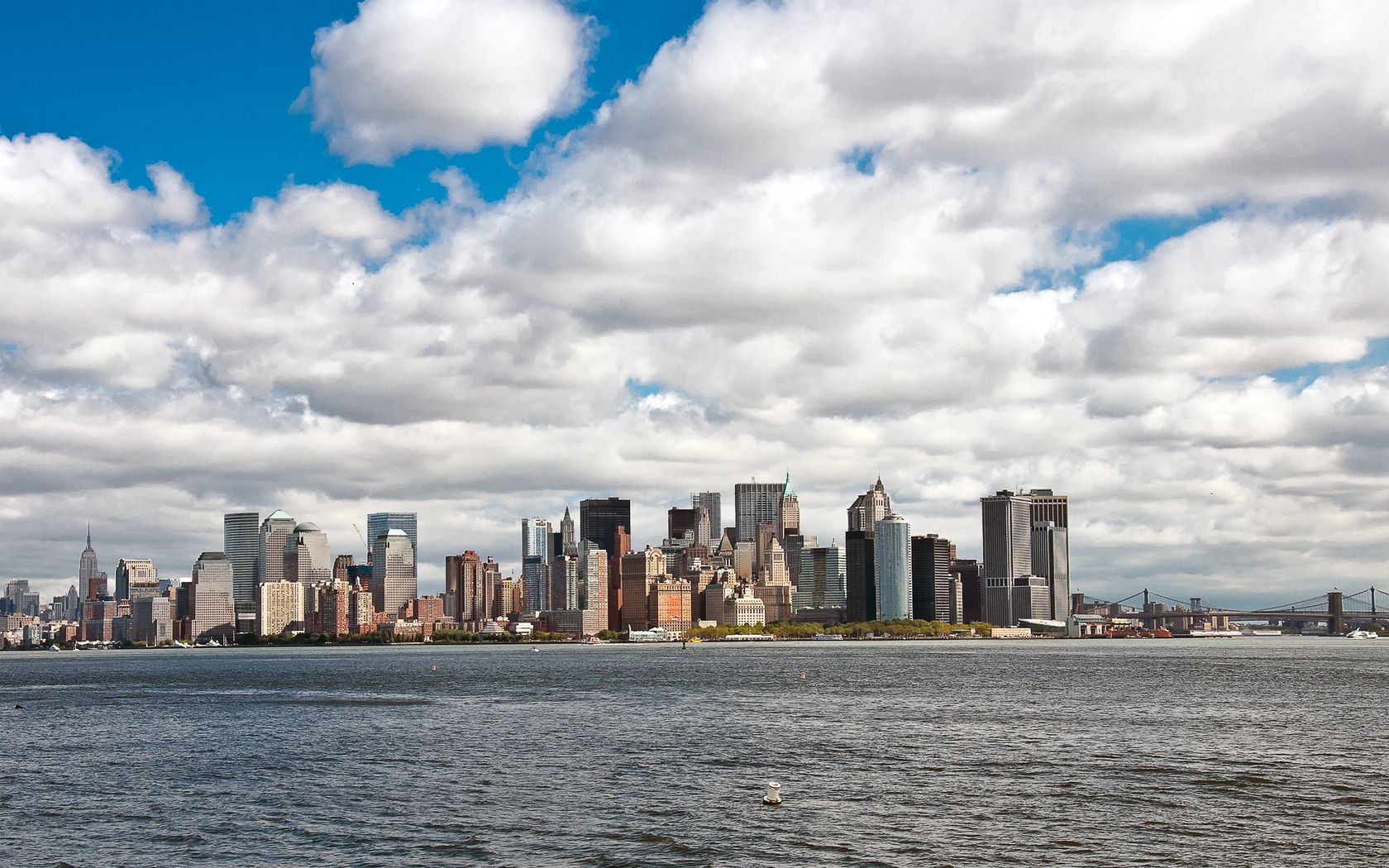 Скачать картинку Нью Йорк, Небо, Города, Небоскребы, Манхеттен в телефон бесплатно.