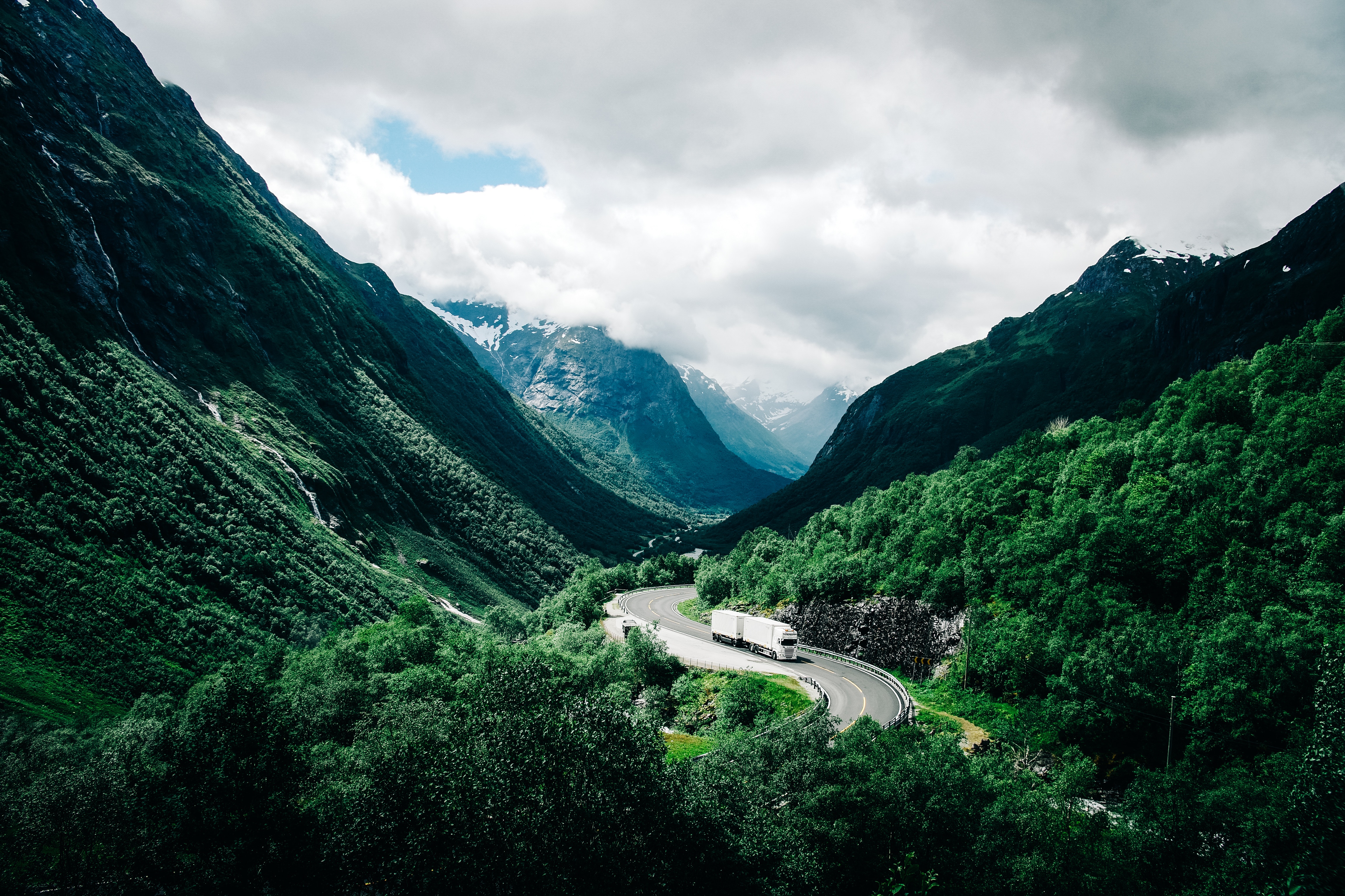 Free download wallpaper Clouds, Norway, Mountains, Nature, Road, Car on your PC desktop