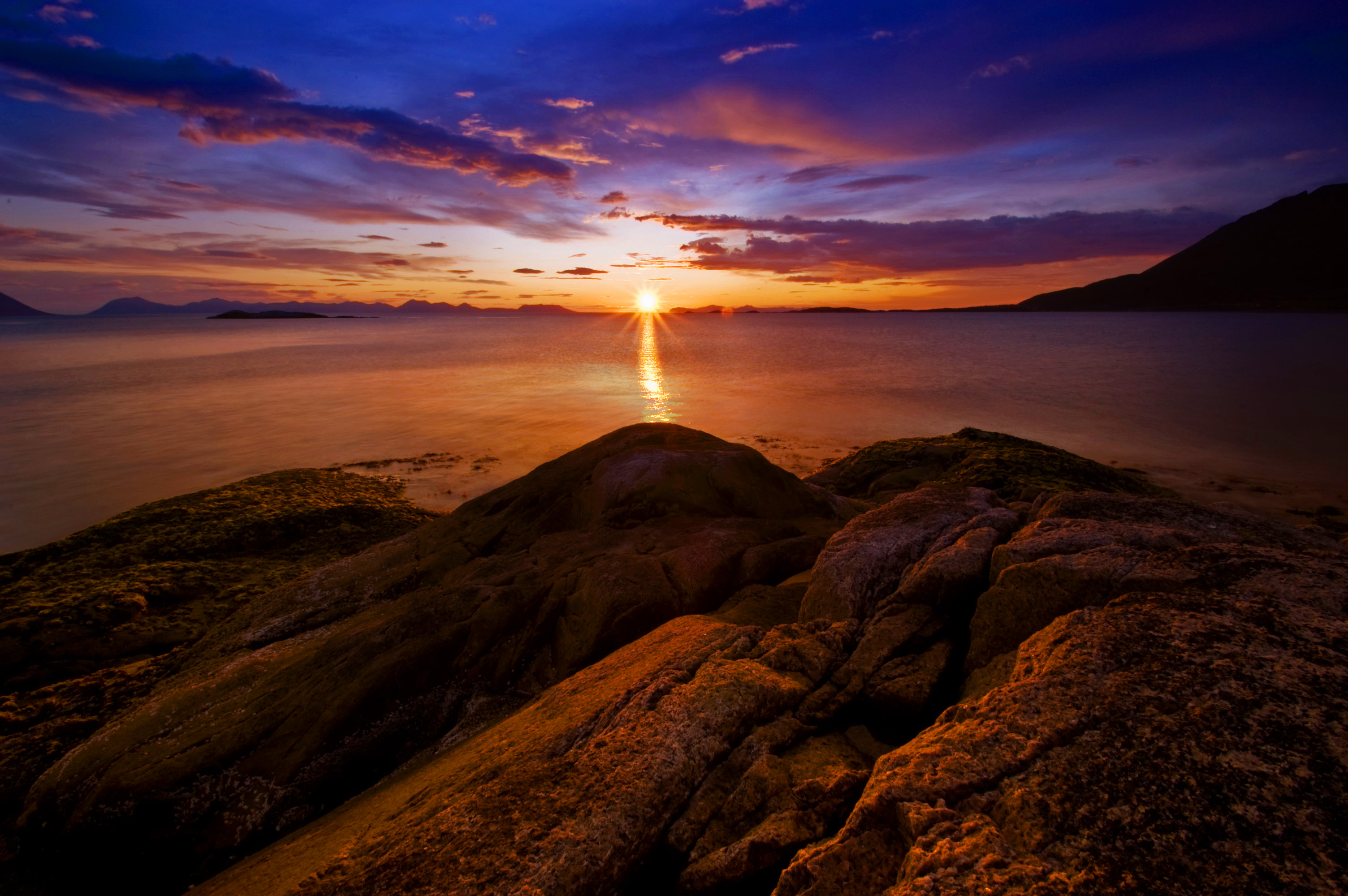 Download mobile wallpaper Rocks, Sea, Horizon, Sunset, Nature, Norway for free.