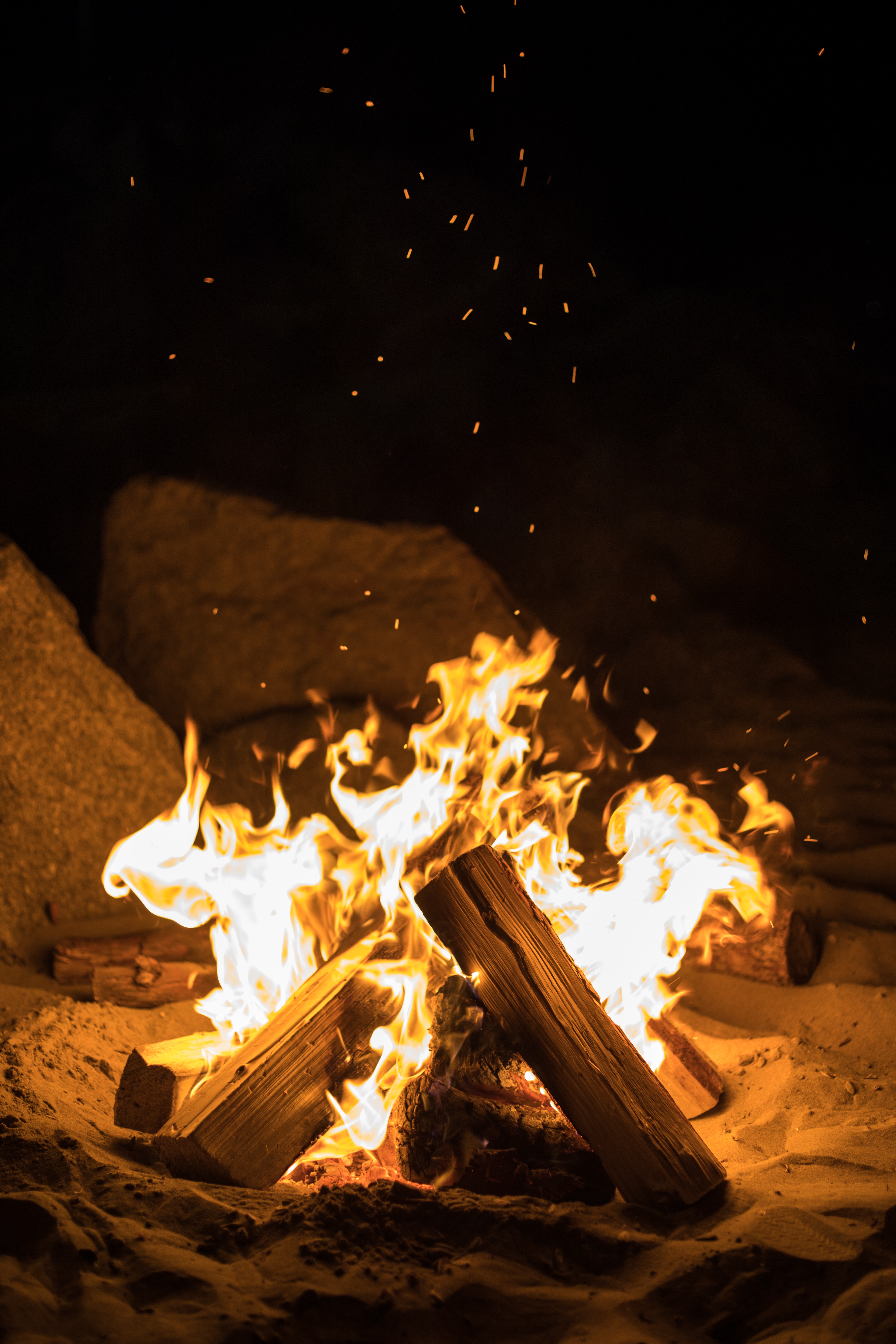 bonfire, firewood, dark, night, fire, flame, sparks phone wallpaper