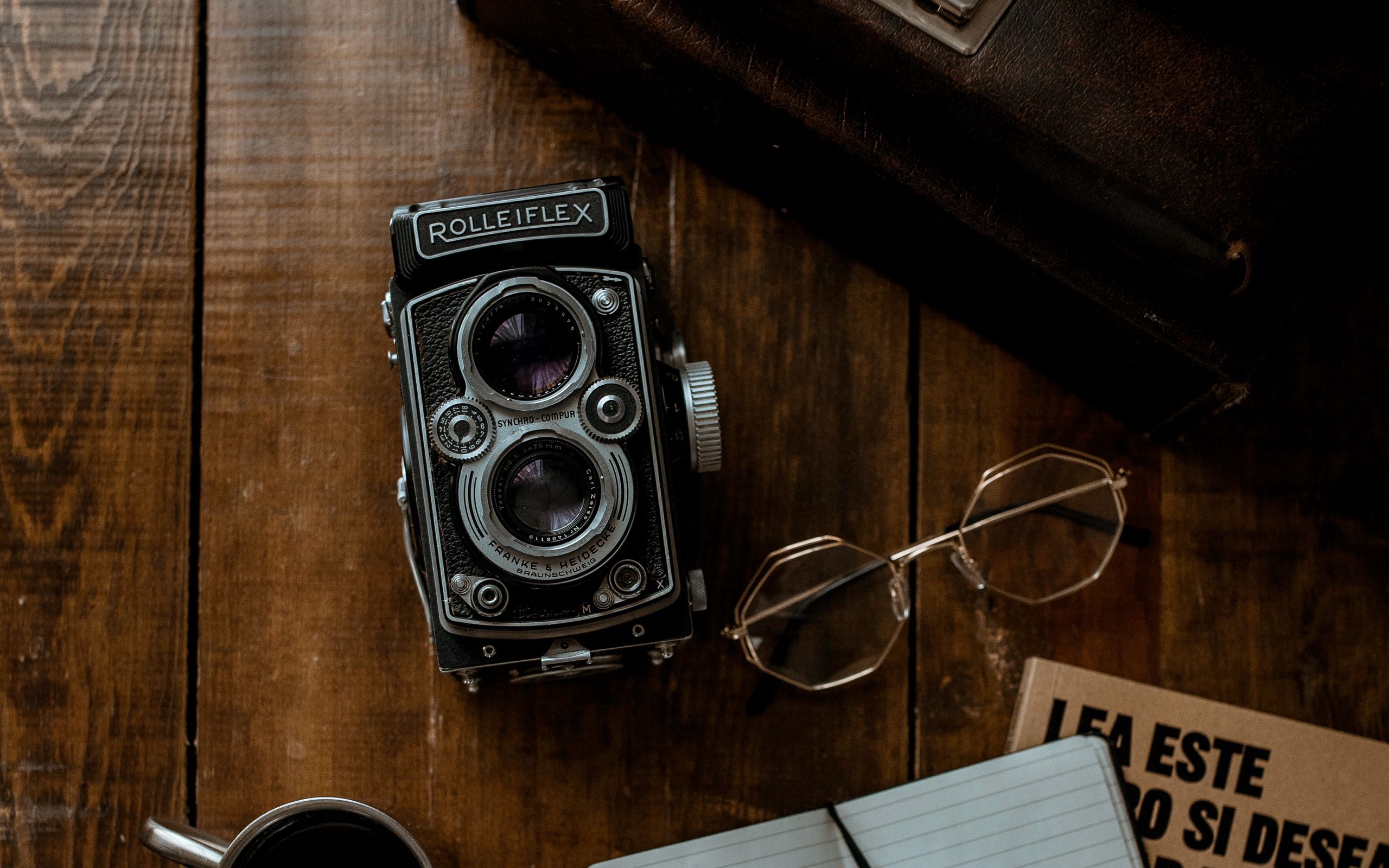 Premium AI Image | vintage camera kept on table in low light beautiful  background