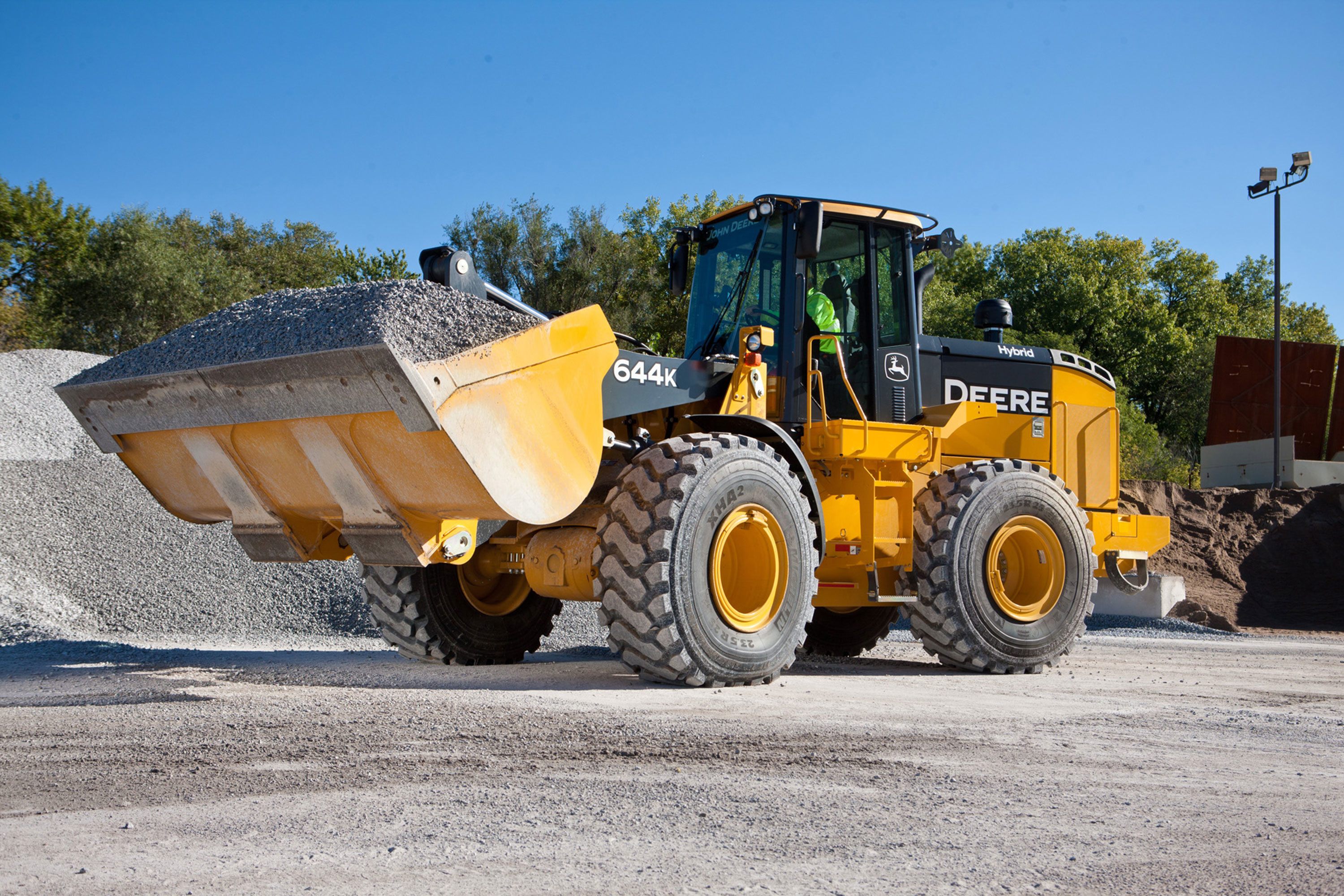 Фото фронтального погрузчика. John Deere 644. Фронтальный погрузчик Джон Дир 644. John Deere 644k Hybrid. Погрузчик фронтальный фронталь 250.