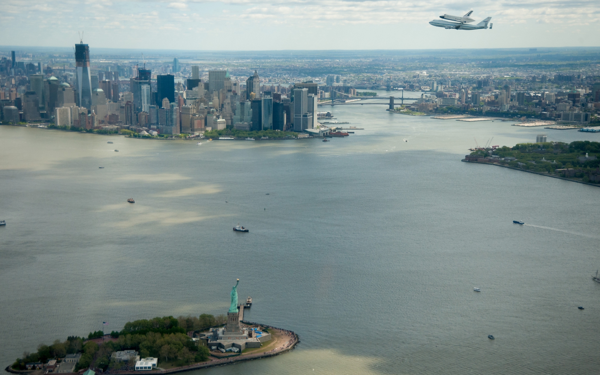 man made, city, airplane, building, cityscape, cloud, new york, shuttle, skyscraper, space shuttle, cities