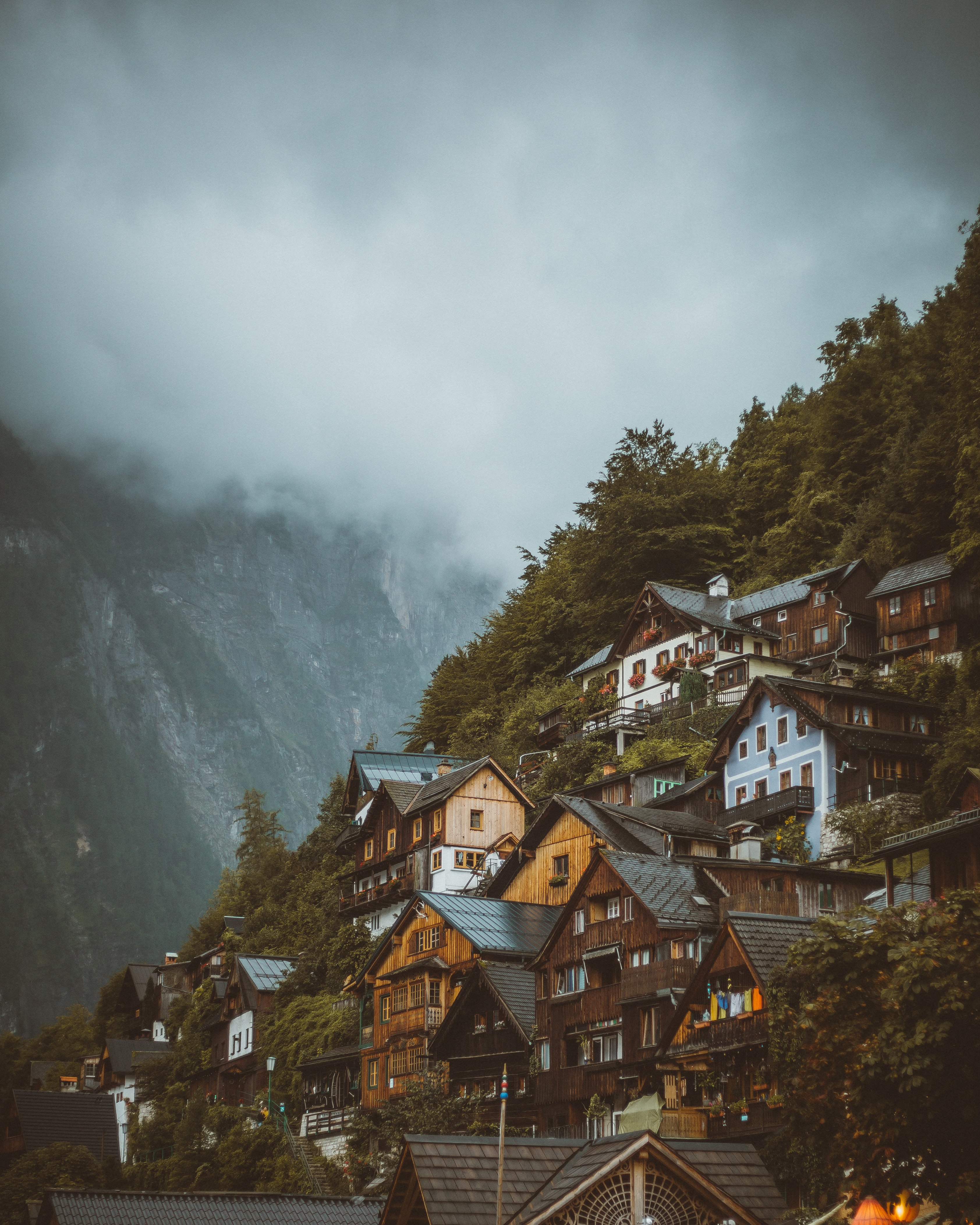 slope, mountains, houses, nature, fog Phone Background