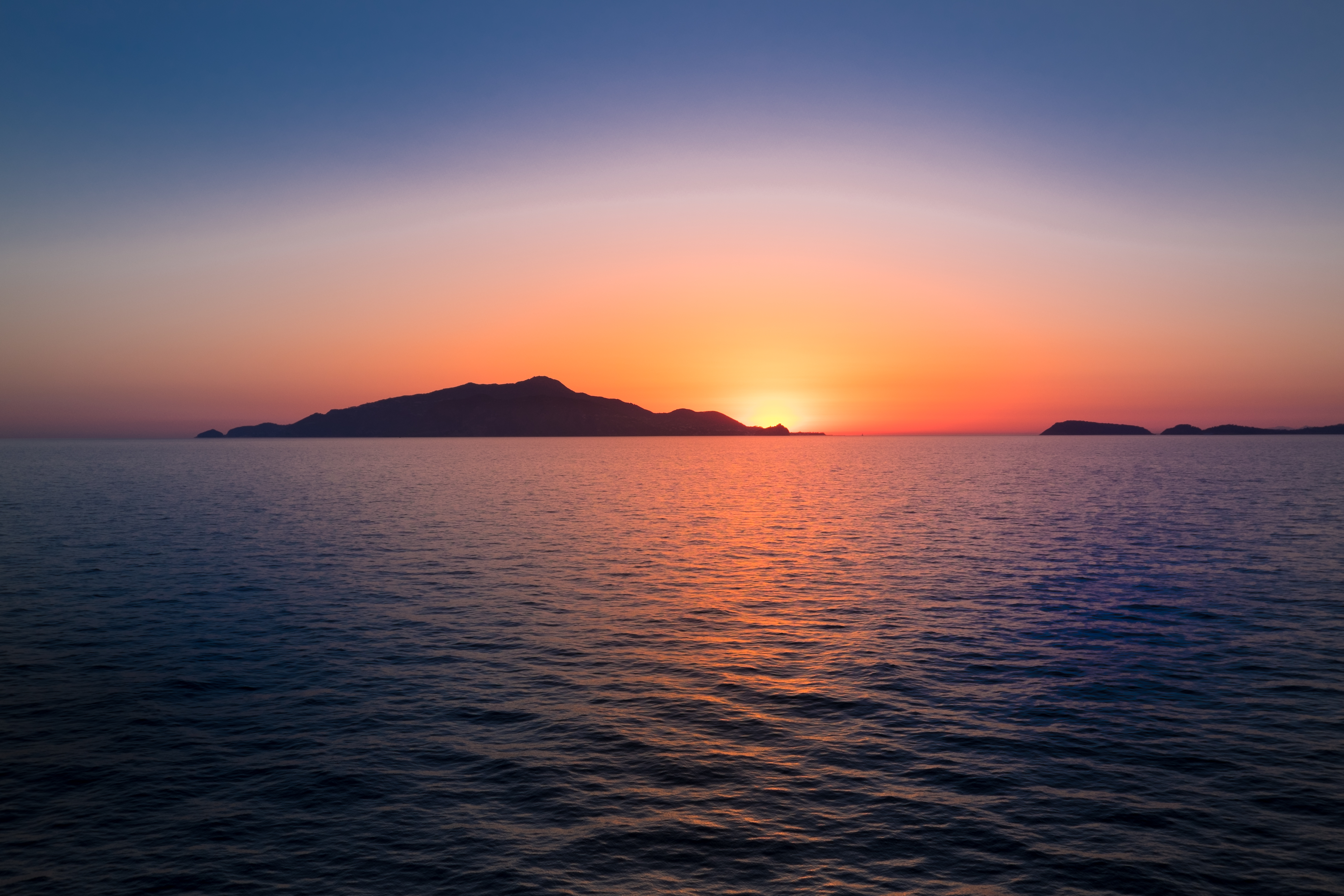 Free download wallpaper Nature, Sunset, Sky, Sea, Glare, Hills on your PC desktop