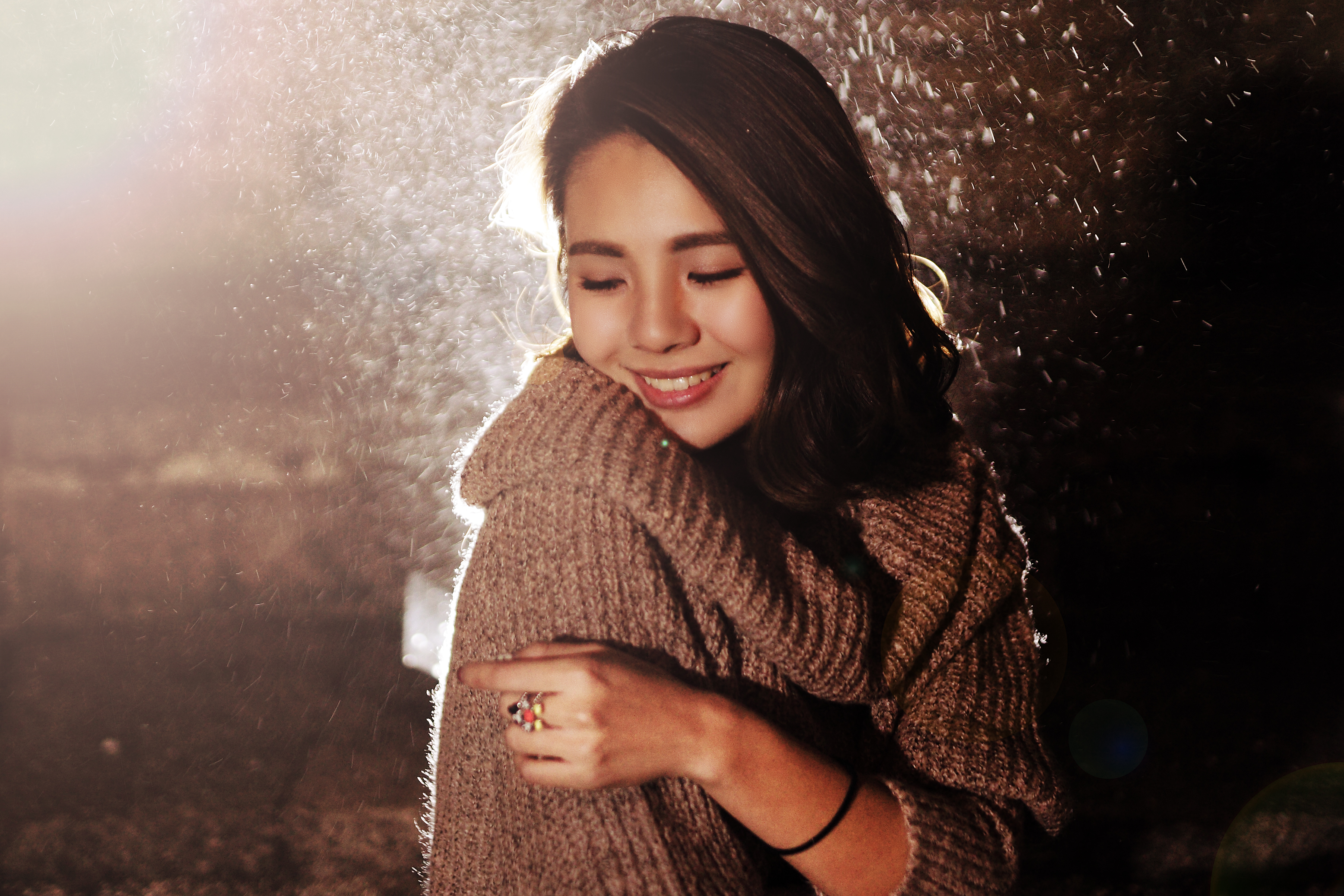 Light smile. Rain smile. Old film woman on backseat Rainy Lights.