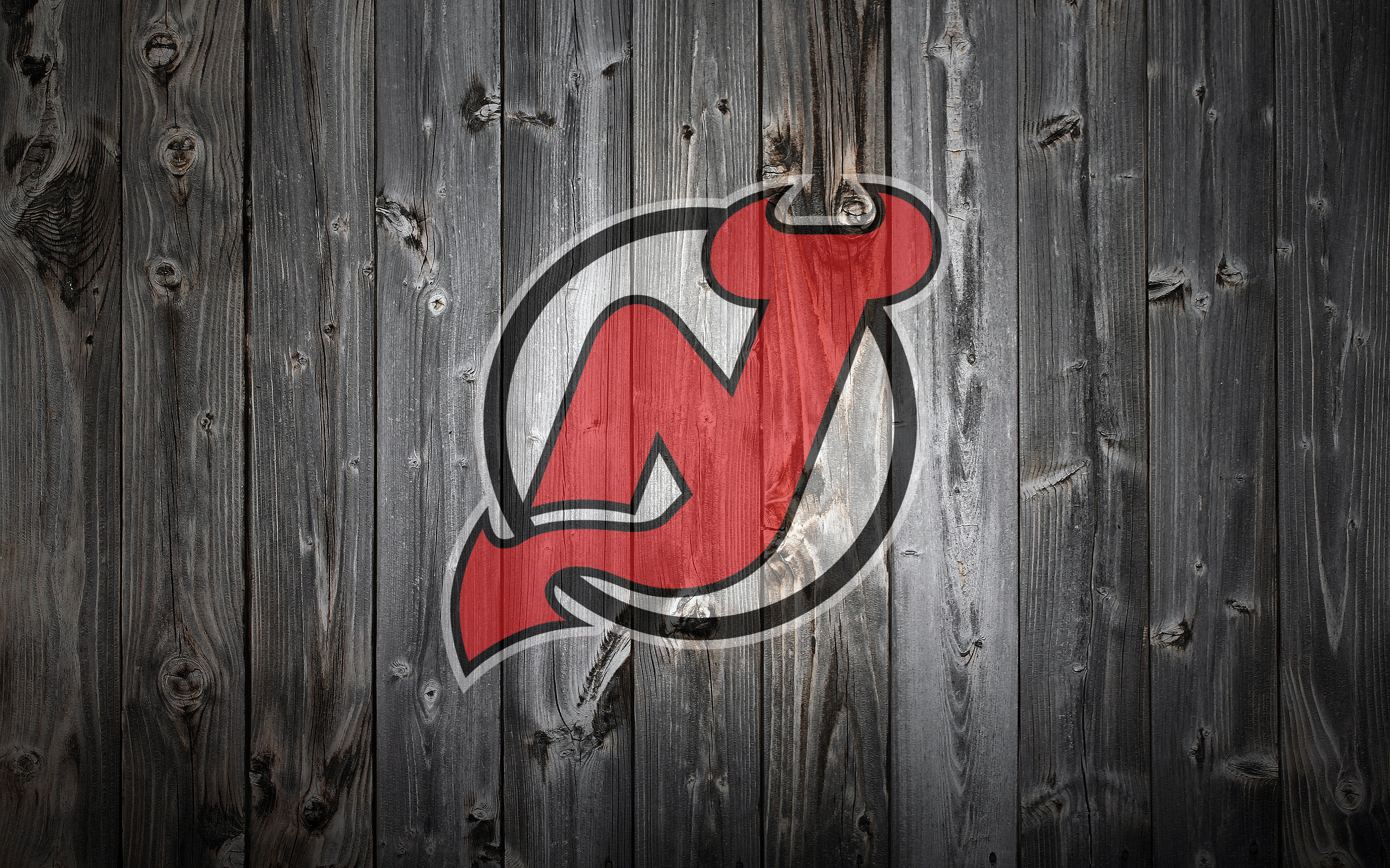 Download Exciting Moments with NJ Devils Player Wallpaper