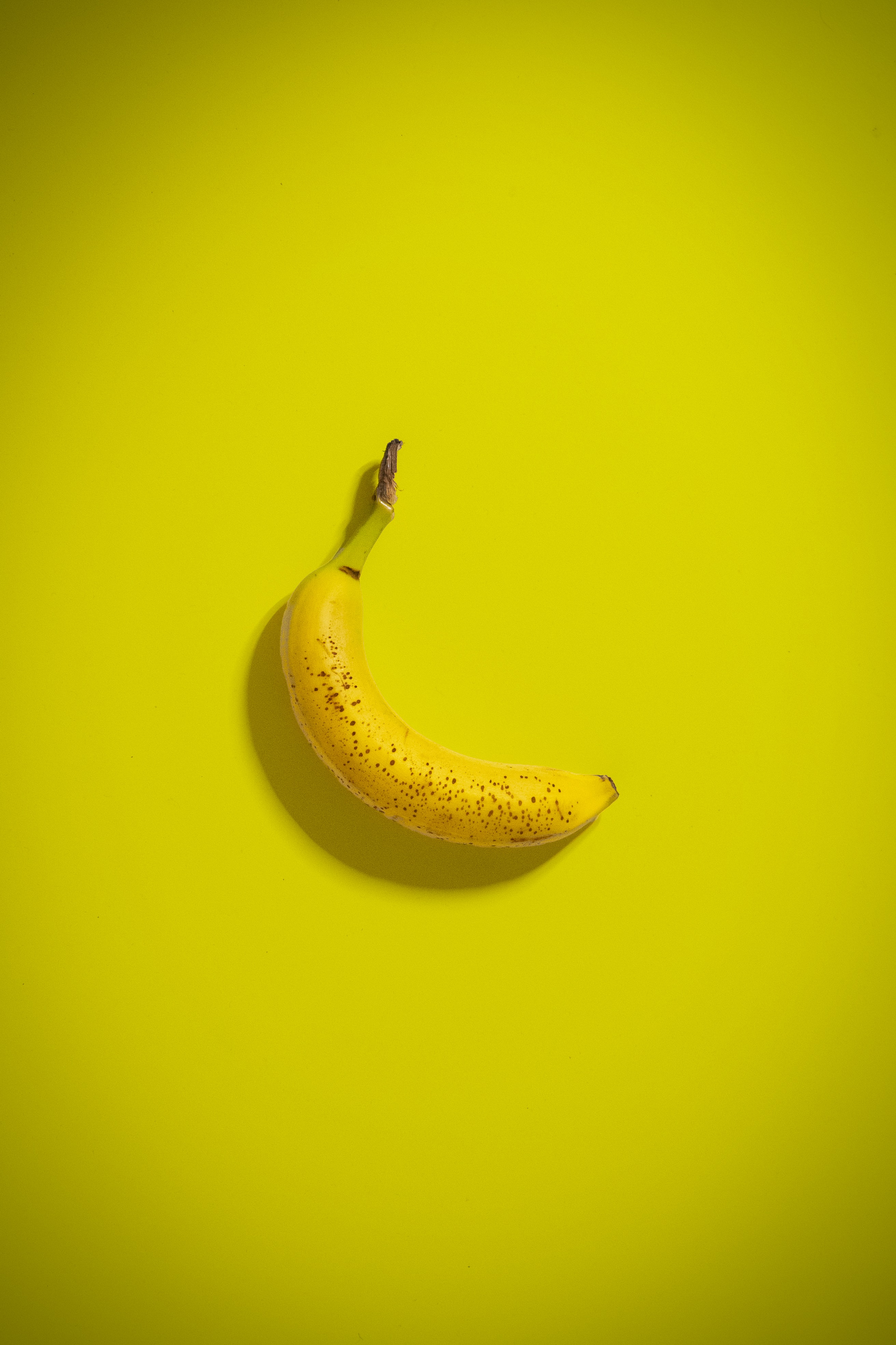 Скачать картинку Банан, Тропический, Фрукт, Еда, Желтый в телефон бесплатно.