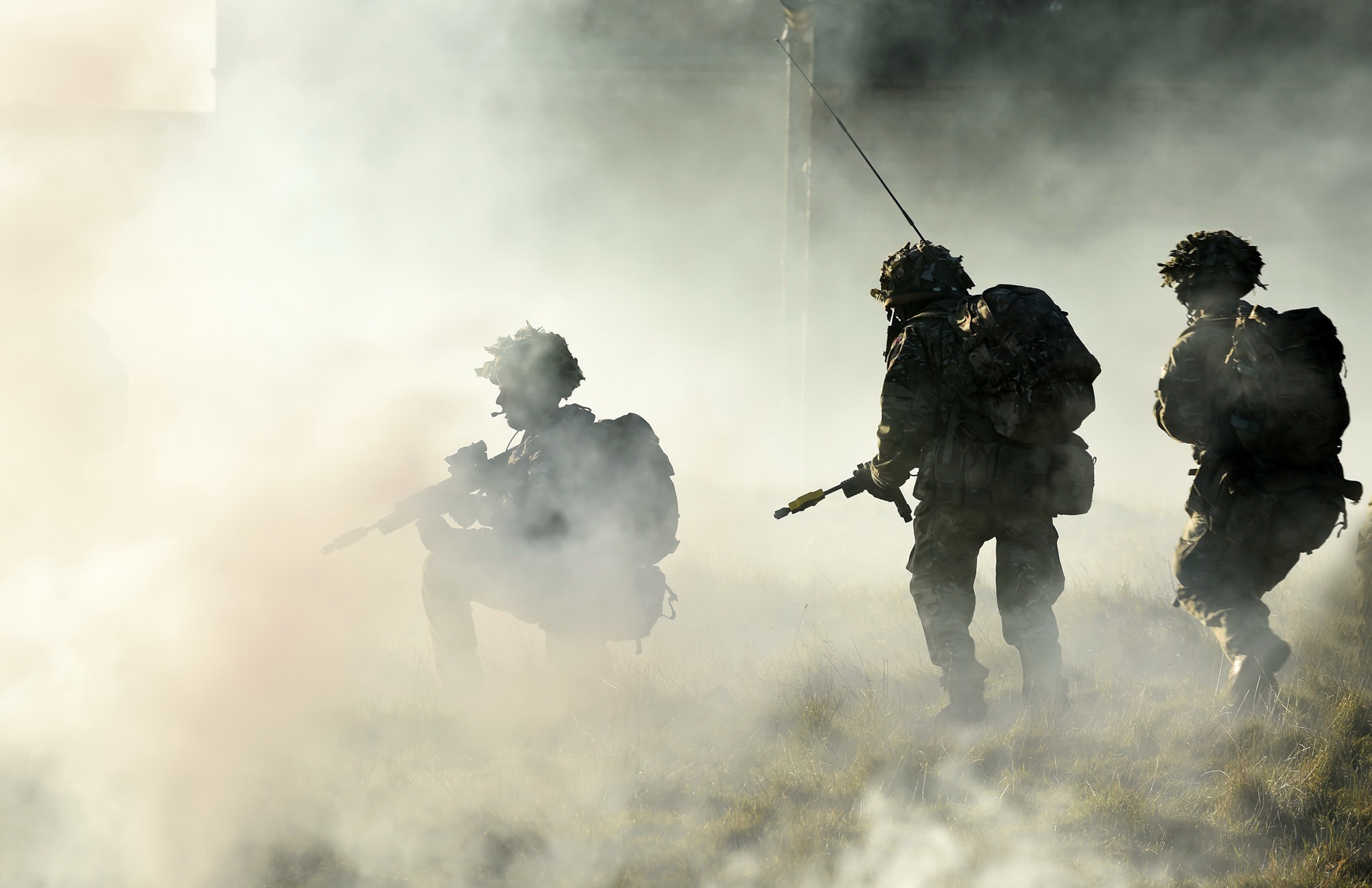 Mobile wallpaper military, soldier, firearm, smoke grenade, smoke, weapon