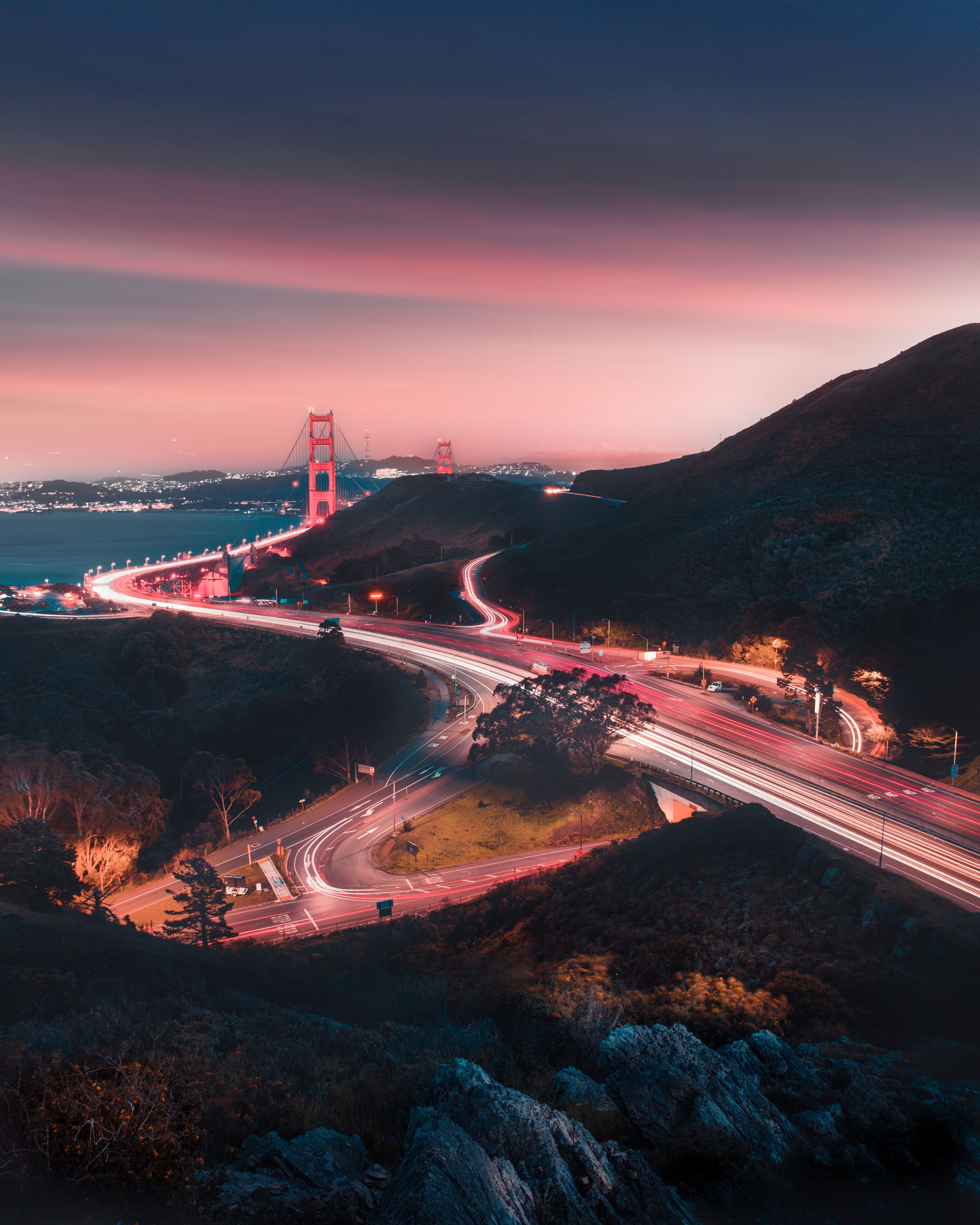 Download mobile wallpaper Cities, Evening, Road, Winding, Bridge, Glow, Sinuous for free.