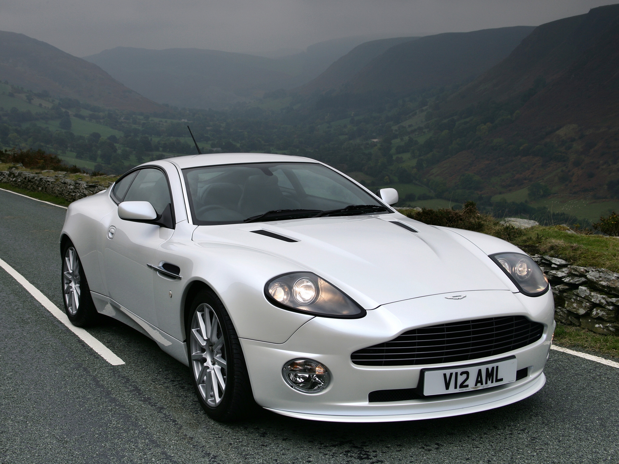 auto, mountains, aston martin, cars, white, front view, 2004, v12, vanquish Free Background