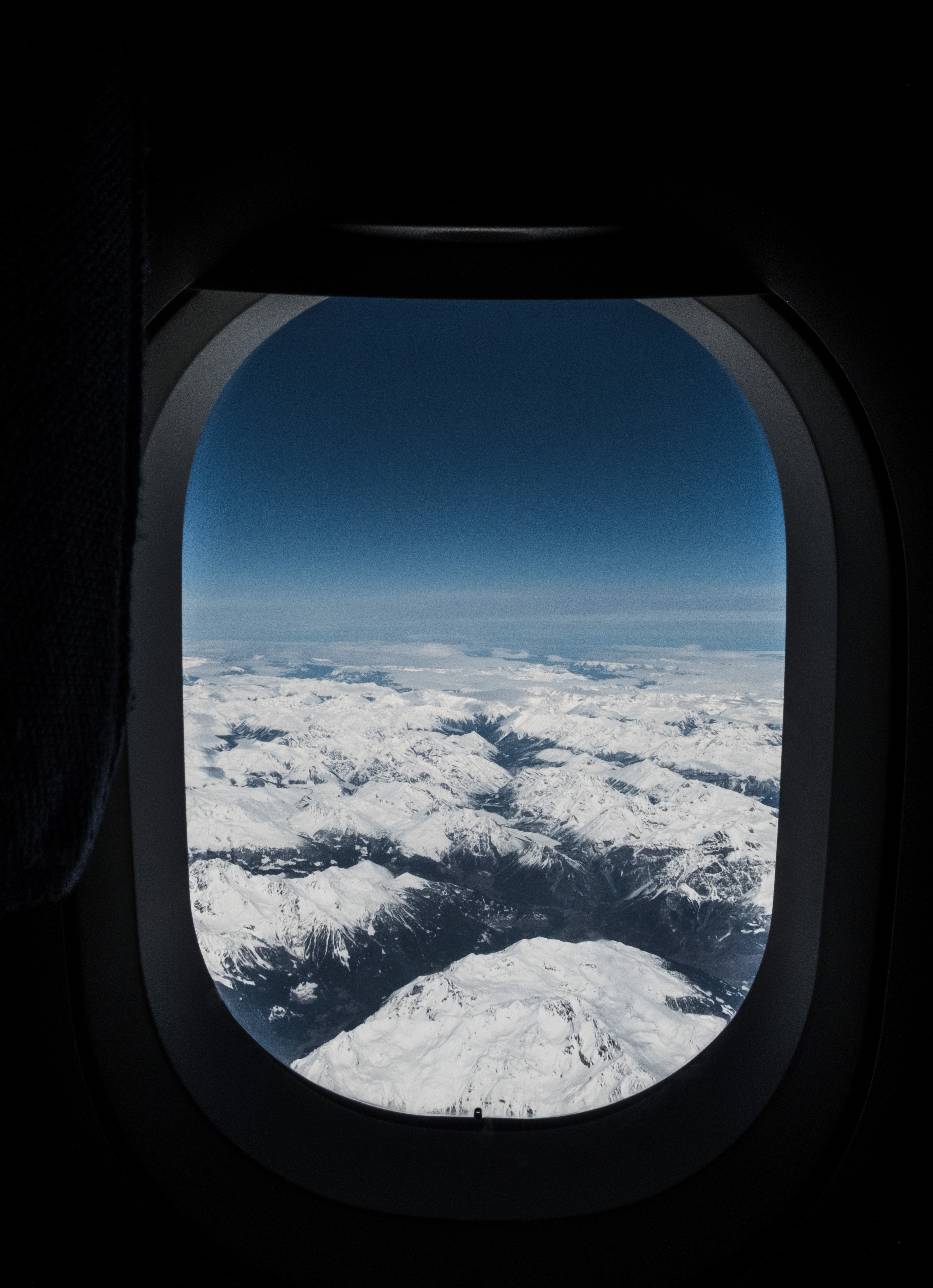 wallpapers tops, miscellaneous, airplane window, sky, mountains, view from above, vertex, miscellanea, flight, porthole, plane window