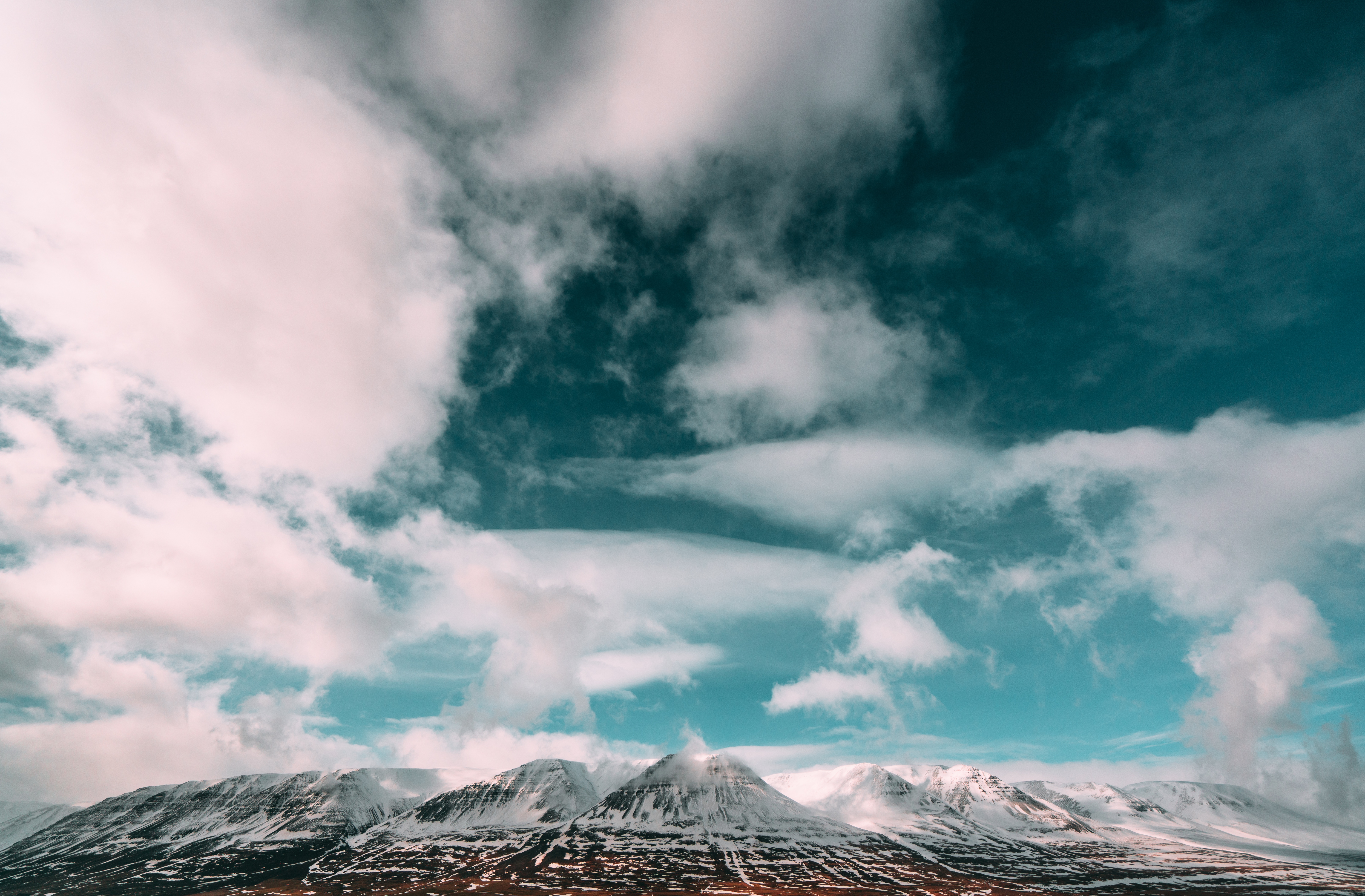 Скачати мобільні шпалери Хмари, Ісландія, Небо, Гори, Природа безкоштовно.