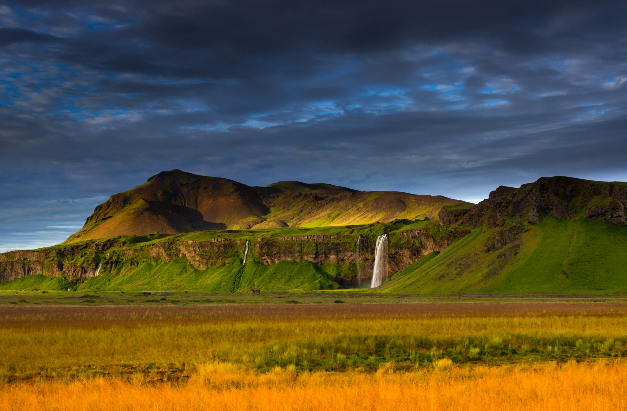 385277 завантажити картинку земля, сельяландсфосс, ісландія, пейзаж, гора, природа, водоспади - шпалери і заставки безкоштовно
