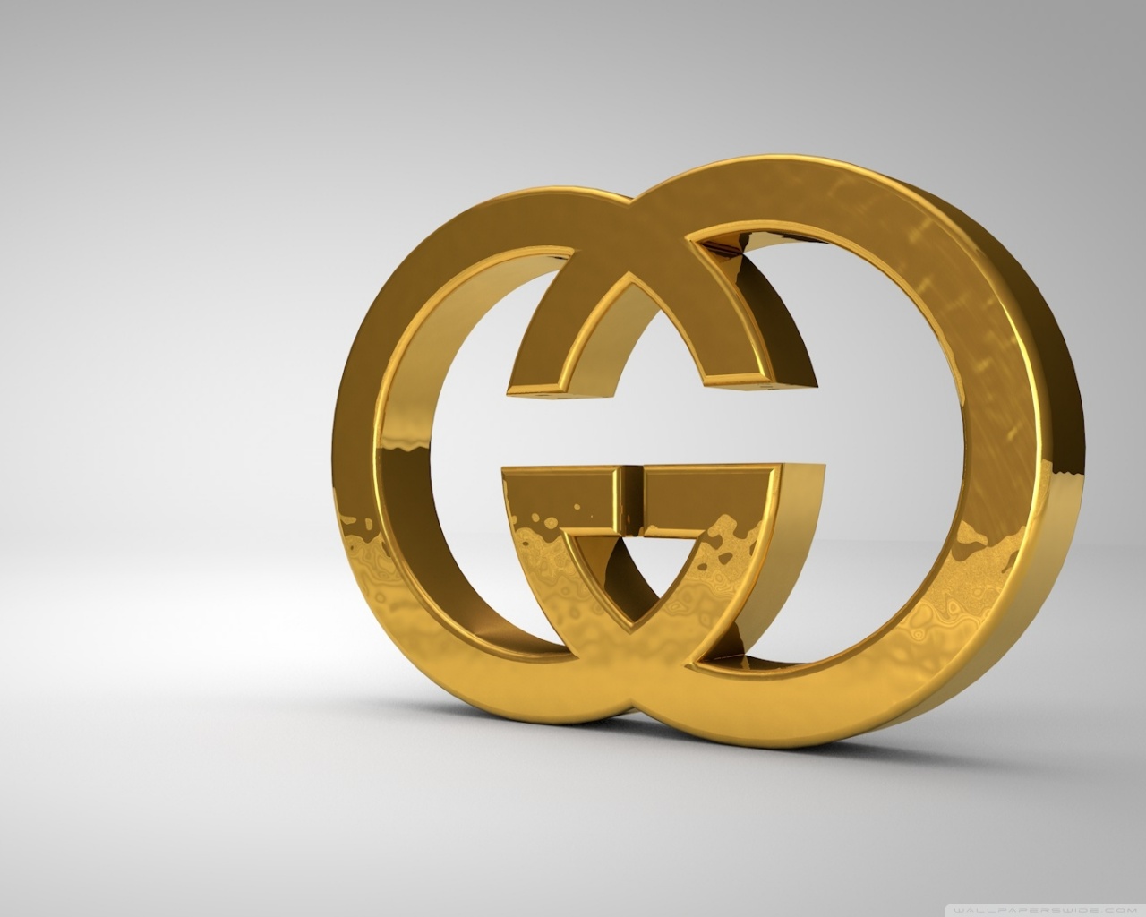 Золотой лого Gucci