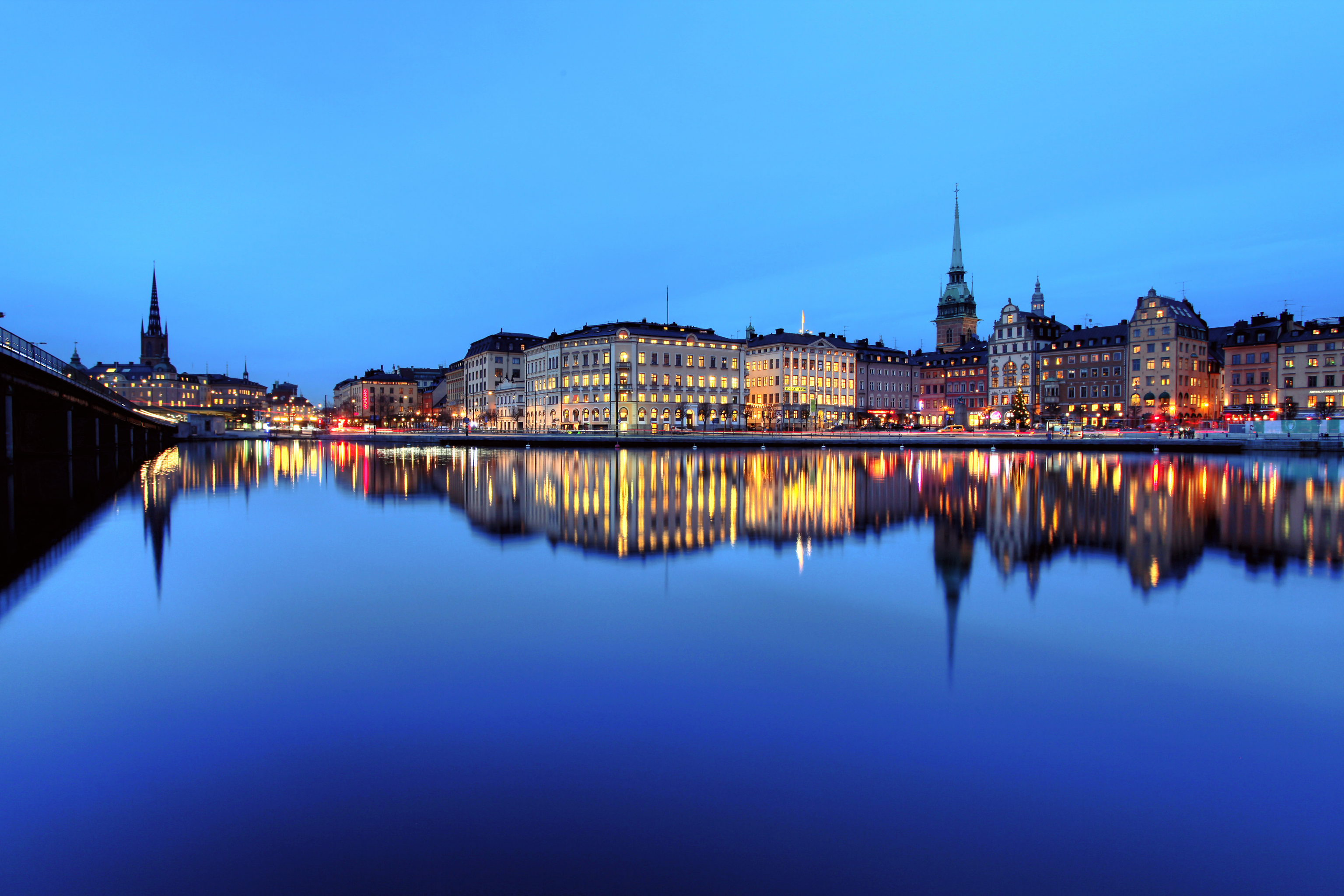 Download mobile wallpaper Cities, Water, Night, City, Building, Reflection, Stockholm, Sweden, Man Made for free.