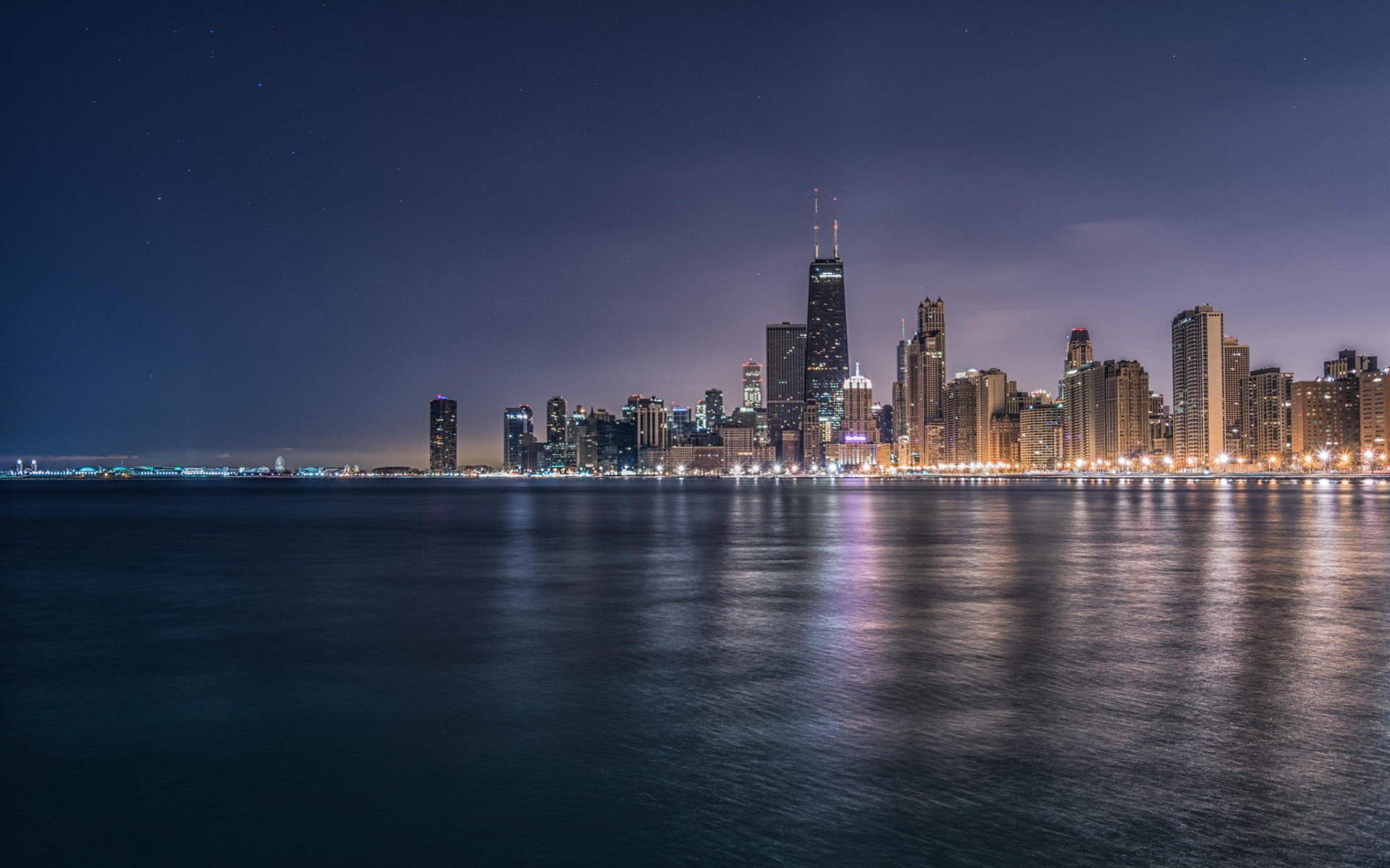 Download Chicago City Night Skyline With Blue Lights Wallpaper