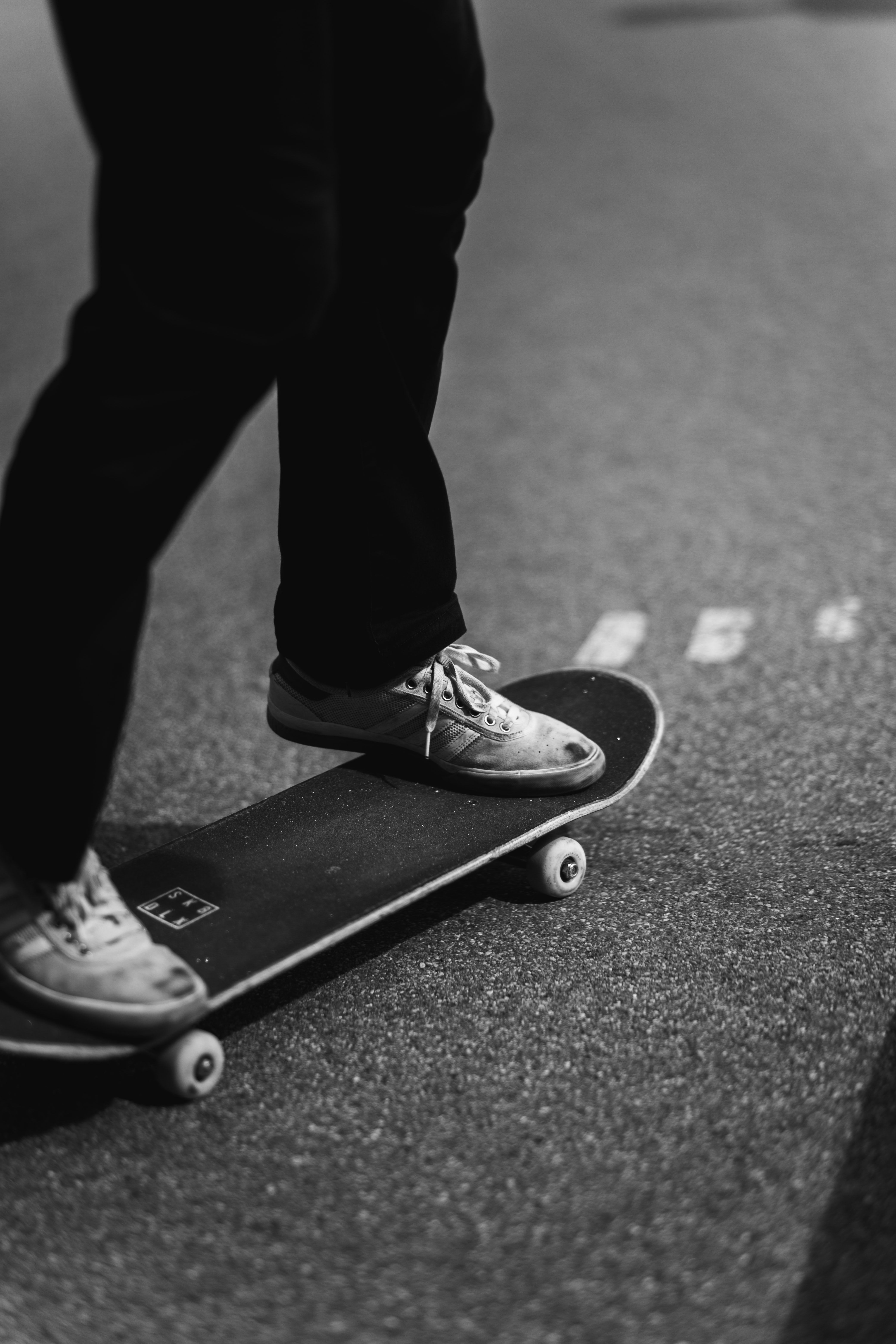 Download mobile wallpaper Skate, Chb, Legs, Sneakers, Bw, Shoes for free.