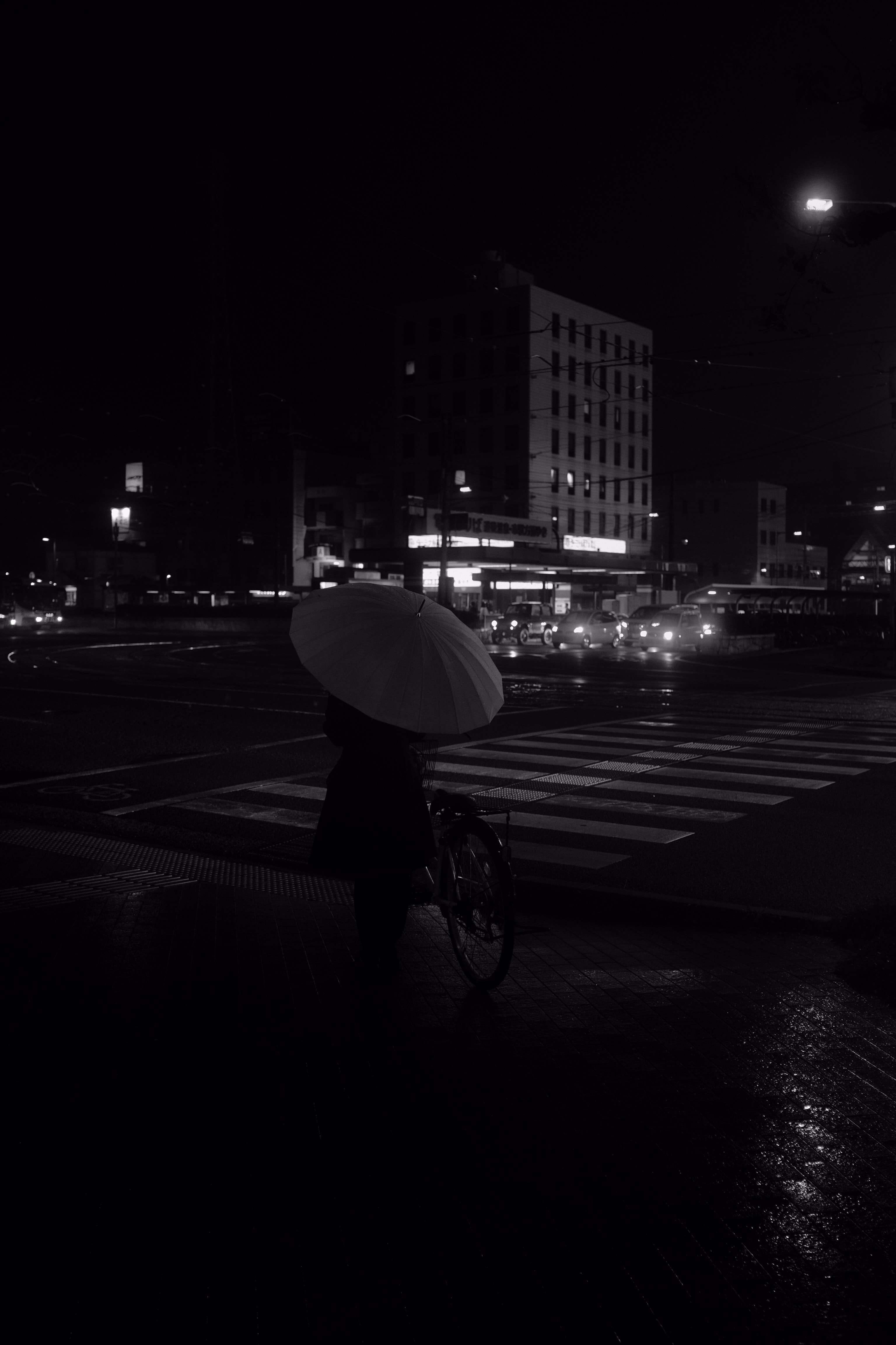Download mobile wallpaper Black And White, City, Road, Night, Street, Umbrella, Girl for free.