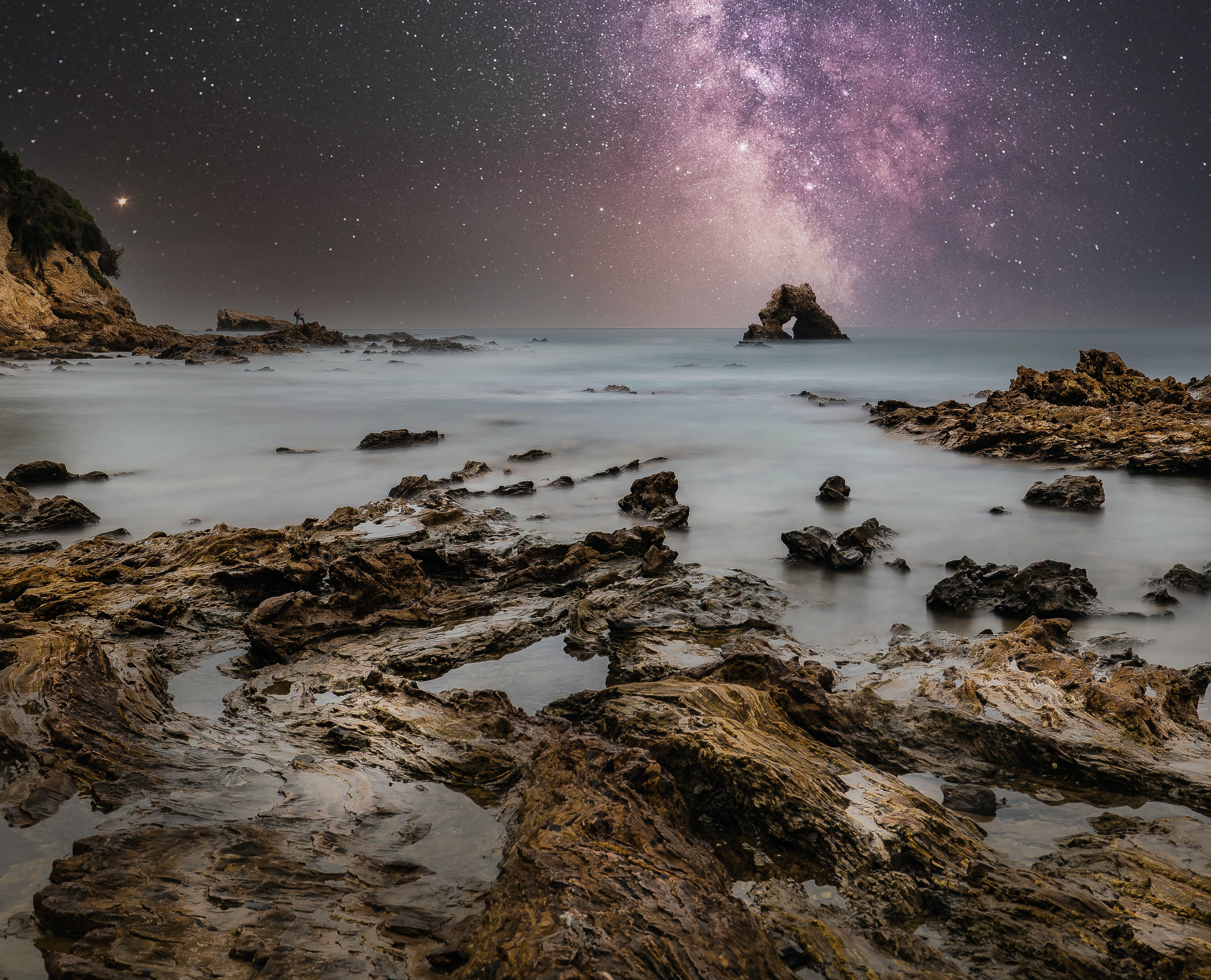 Download mobile wallpaper Bank, Rocks, Shore, Water, Starry Sky, Sea, Nature for free.