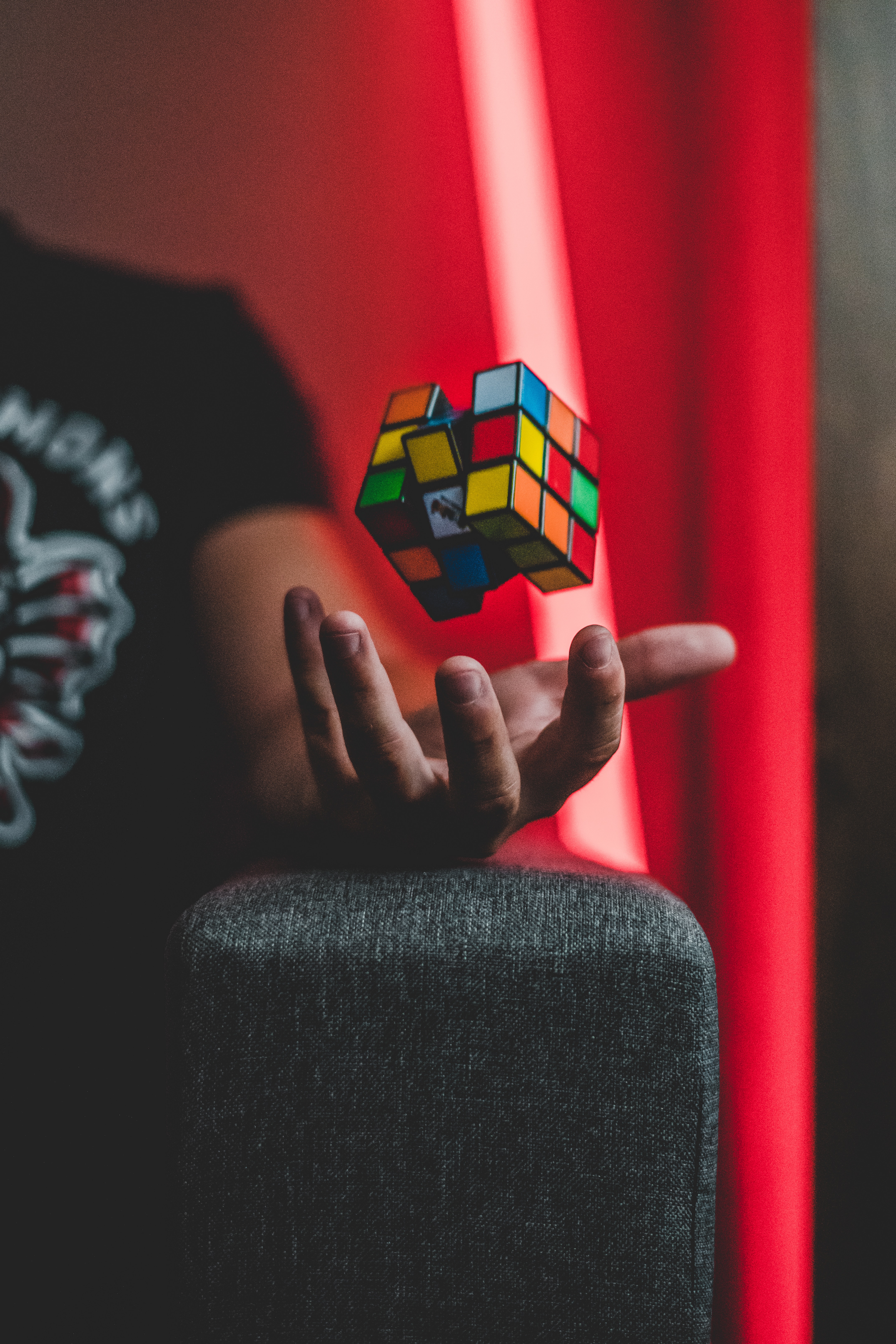 rubik's cube, hand, levitation, miscellanea, miscellaneous, multicolored, motley wallpapers for tablet