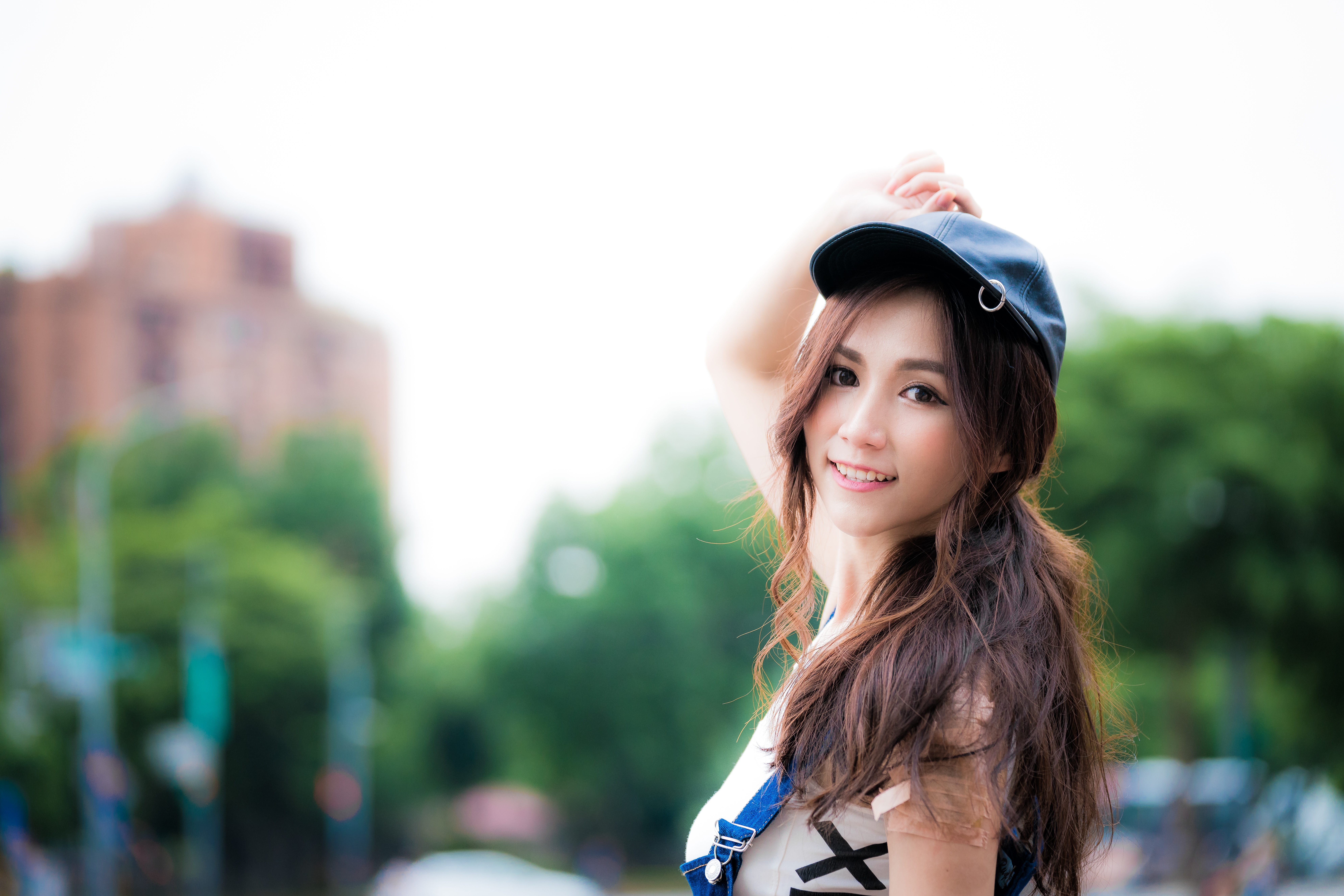 Download mobile wallpaper Smile, Cap, Brunette, Model, Women, Asian, Depth Of Field for free.