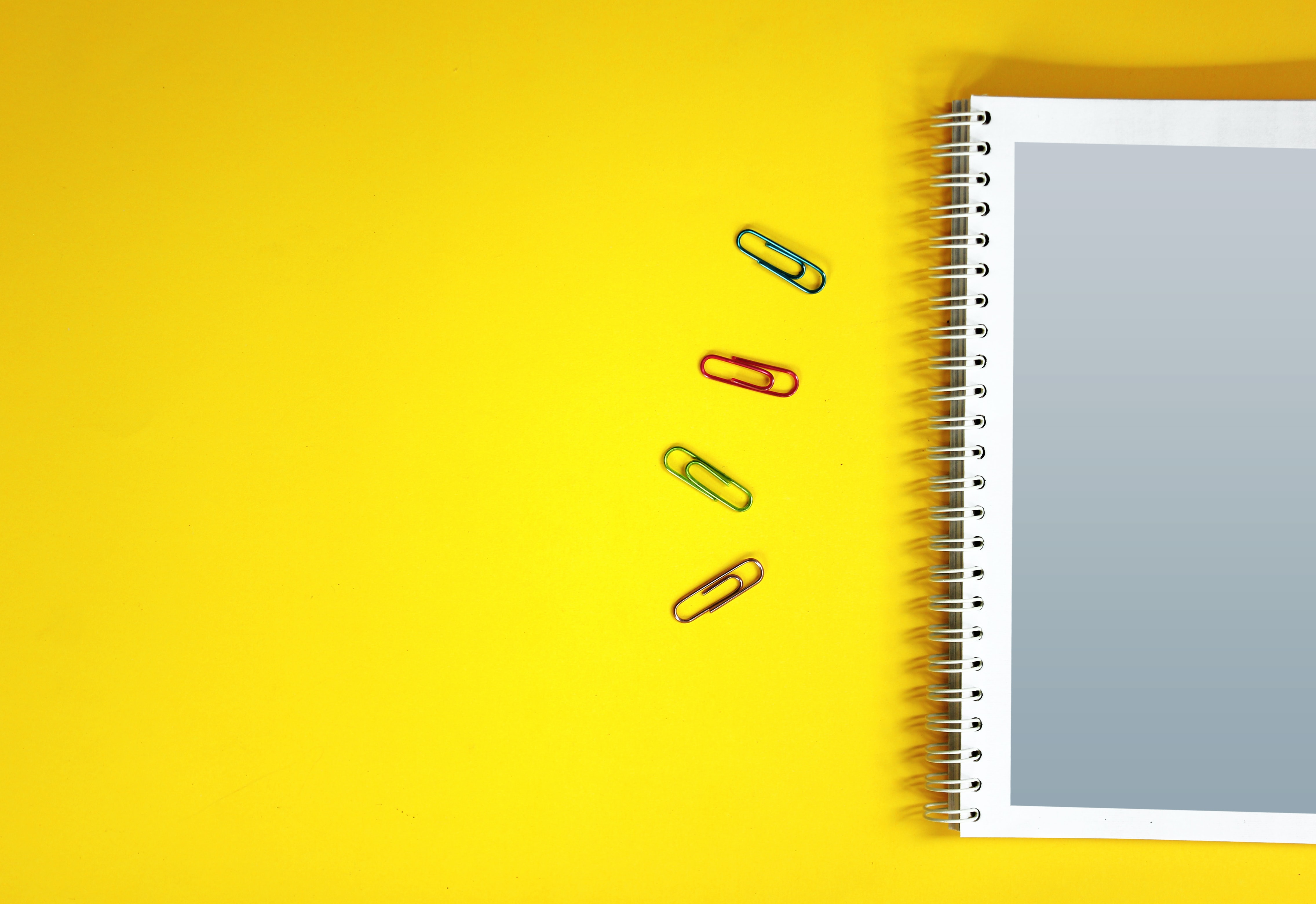 yellow, miscellanea, miscellaneous, surface, notebook, notepad, paper clip, paper clips