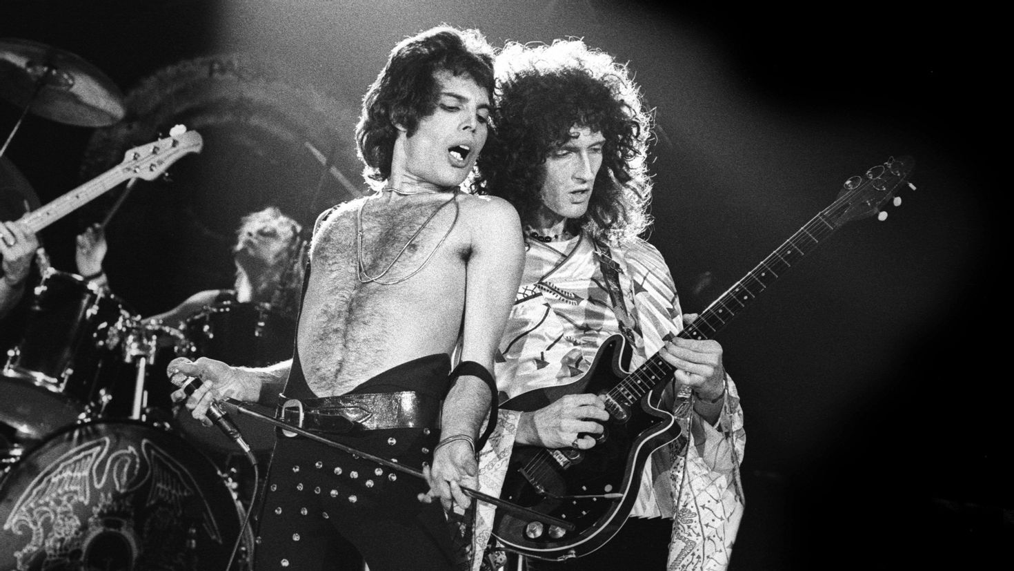 Мировой рок слушать. Группа Queen 70s. Брайан Мэй на концерте Queen. Группа Квин фото. Группа Queen Фредди Меркьюри.