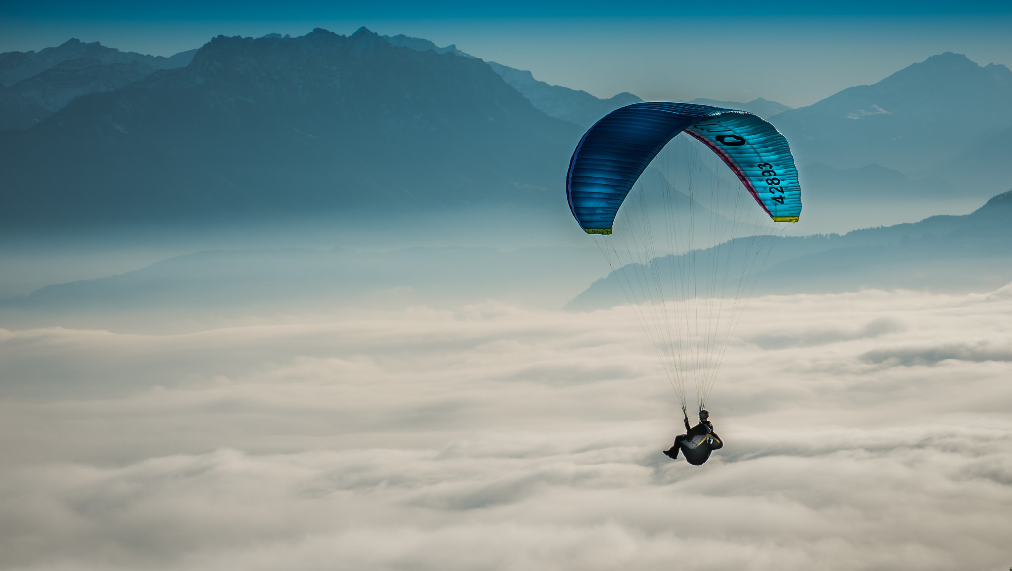 59025 Hintergrundbild herunterladen sport, sky, clouds, gleitschirmfliegen, gleitschirm - Bildschirmschoner und Bilder kostenlos