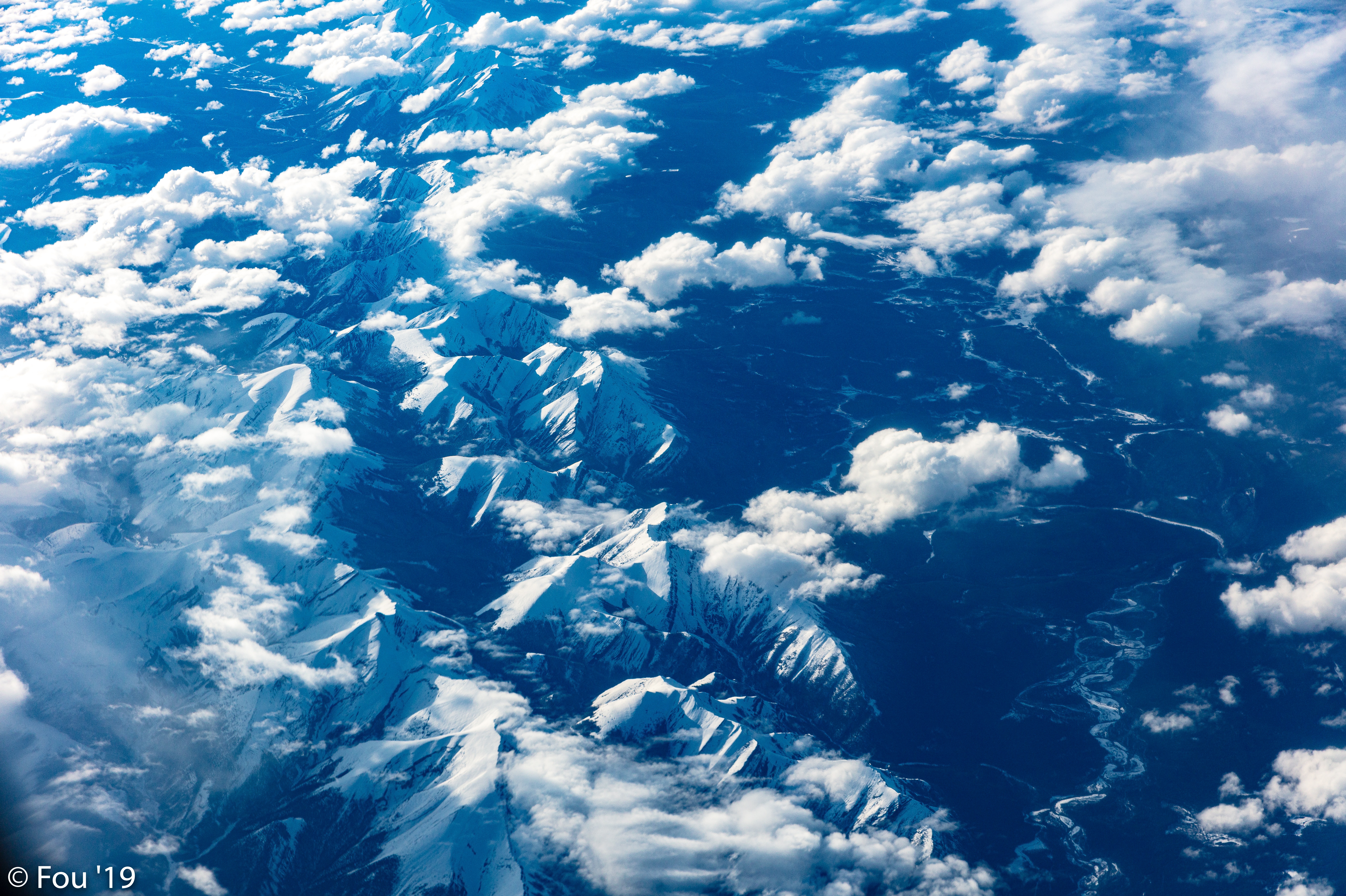 Download mobile wallpaper Clouds, Overview, Height, View, Review, View From Above, Mountains, Nature for free.