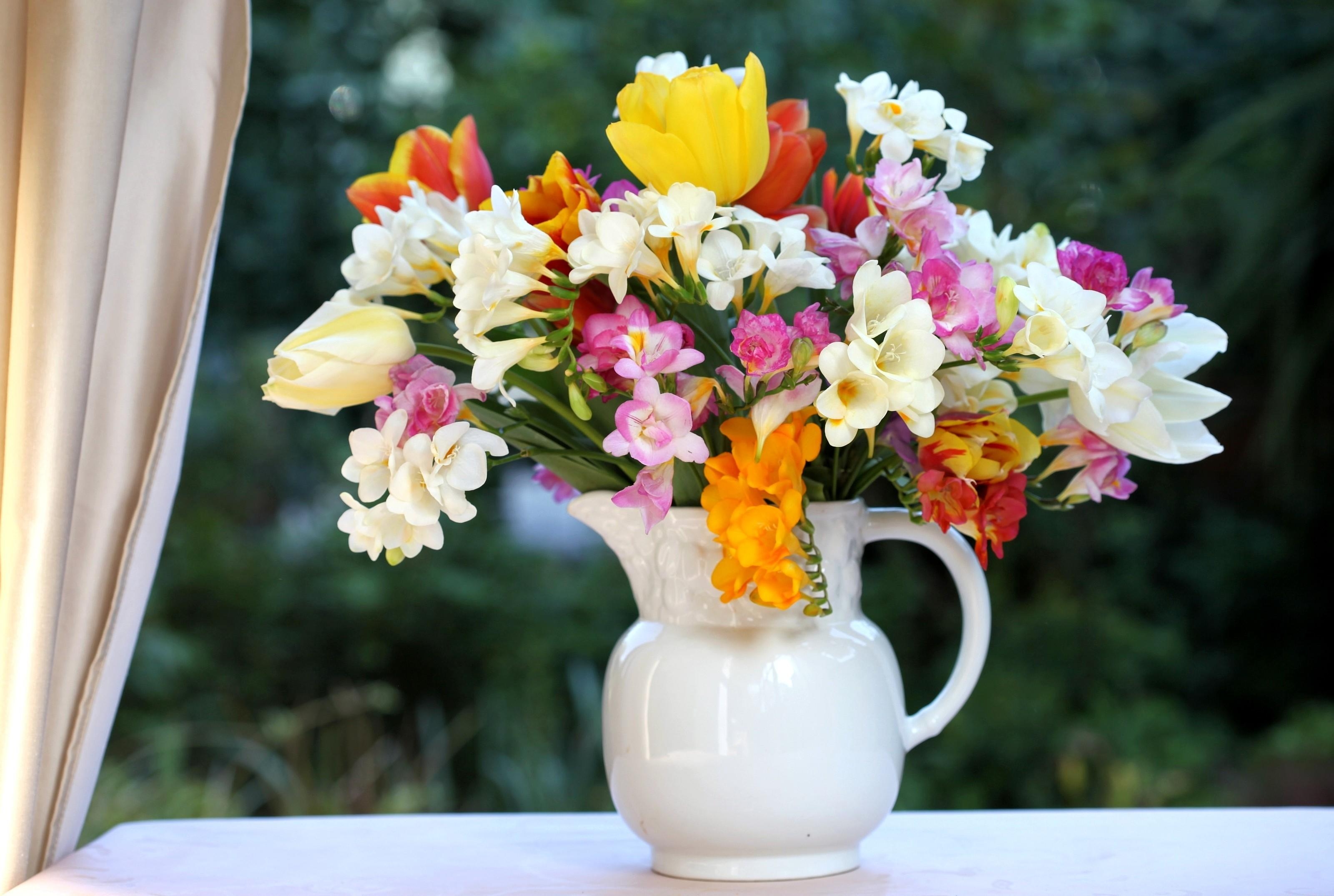 Mobile wallpaper flowers, tulips, bouquet, jug, window, freesia