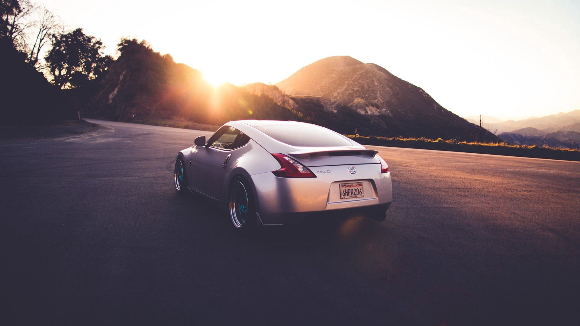 Download mobile wallpaper Traffic, Movement, 370 Z, Road, Nissan, Auto, Cars for free.