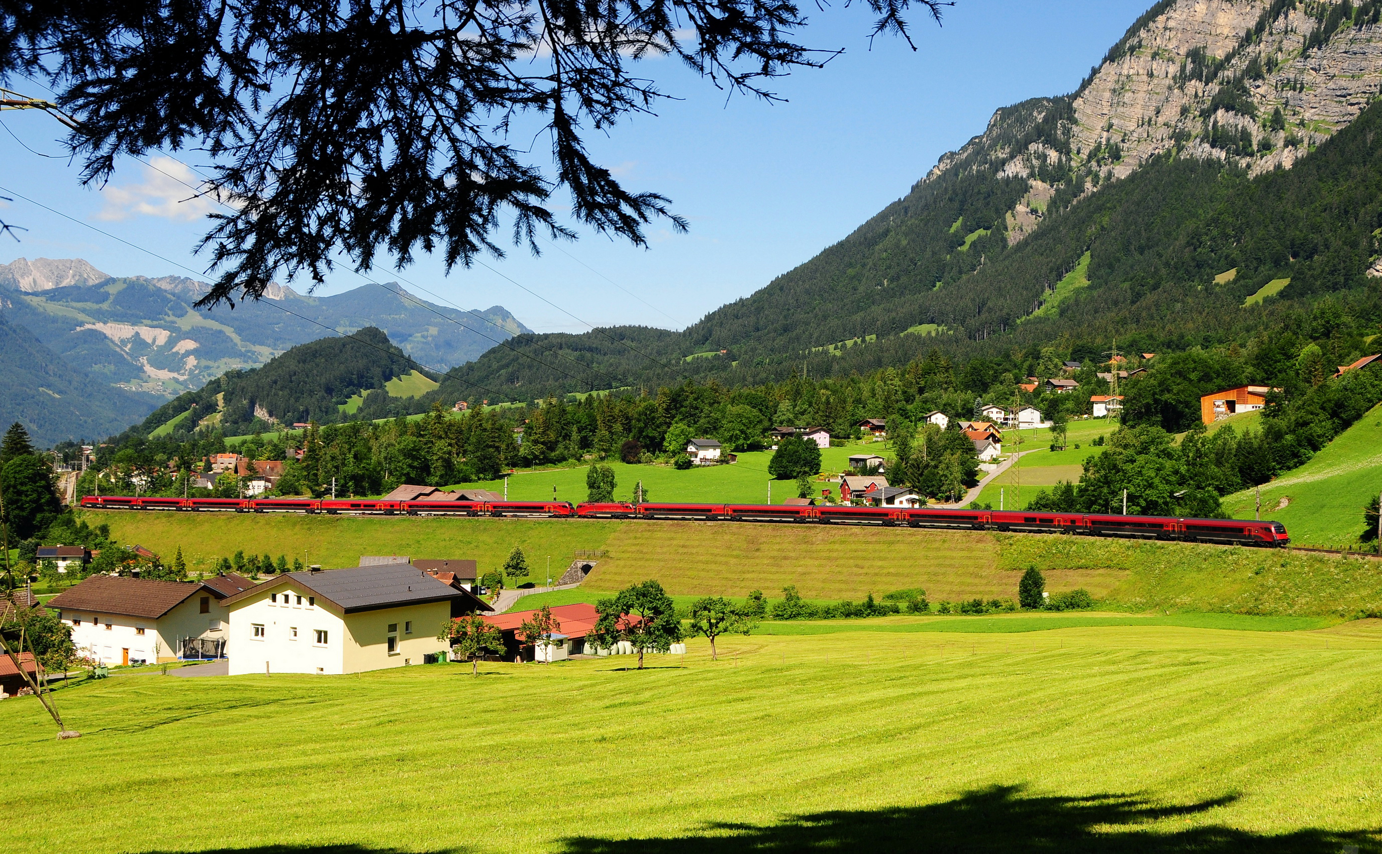 Download mobile wallpaper Austria, Trees, Nature, Grass, Mountains for free.
