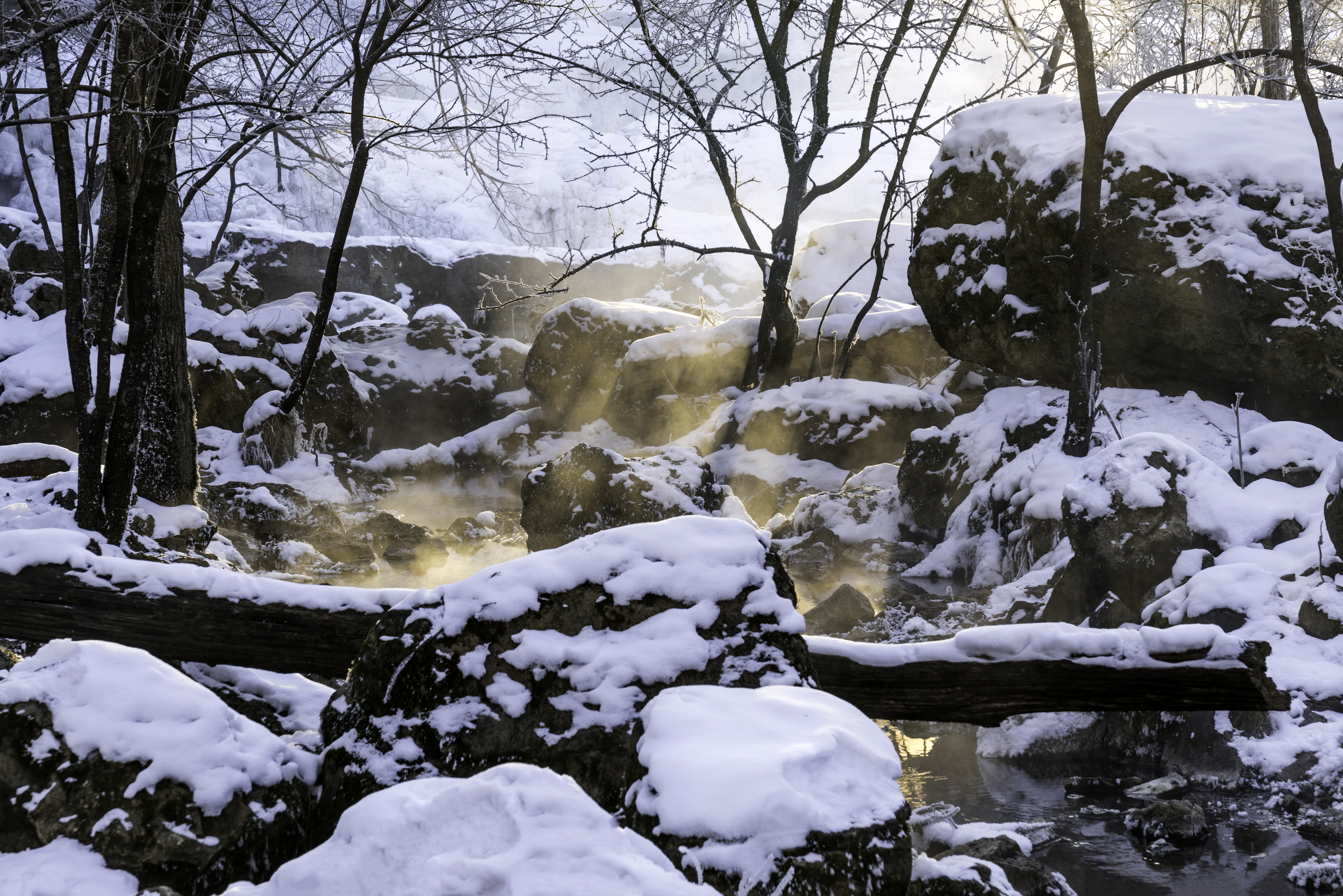 Download mobile wallpaper Snow, Rocks, Winter, Glow, Steam, Nature for free.