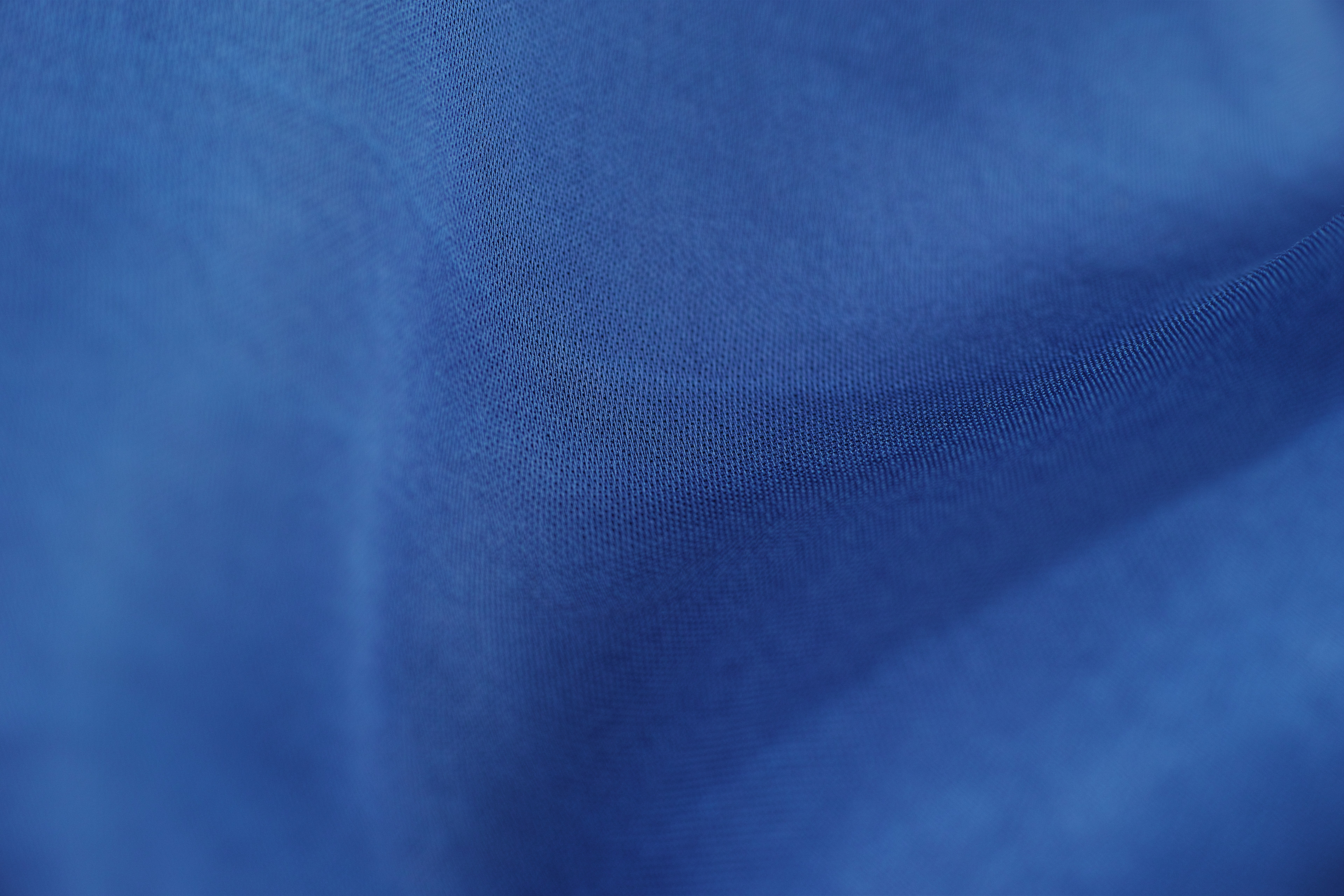 Полотно голубые. Синяя ткань. Текстурированная ткань. Текстура ткани. Шелк текстура.