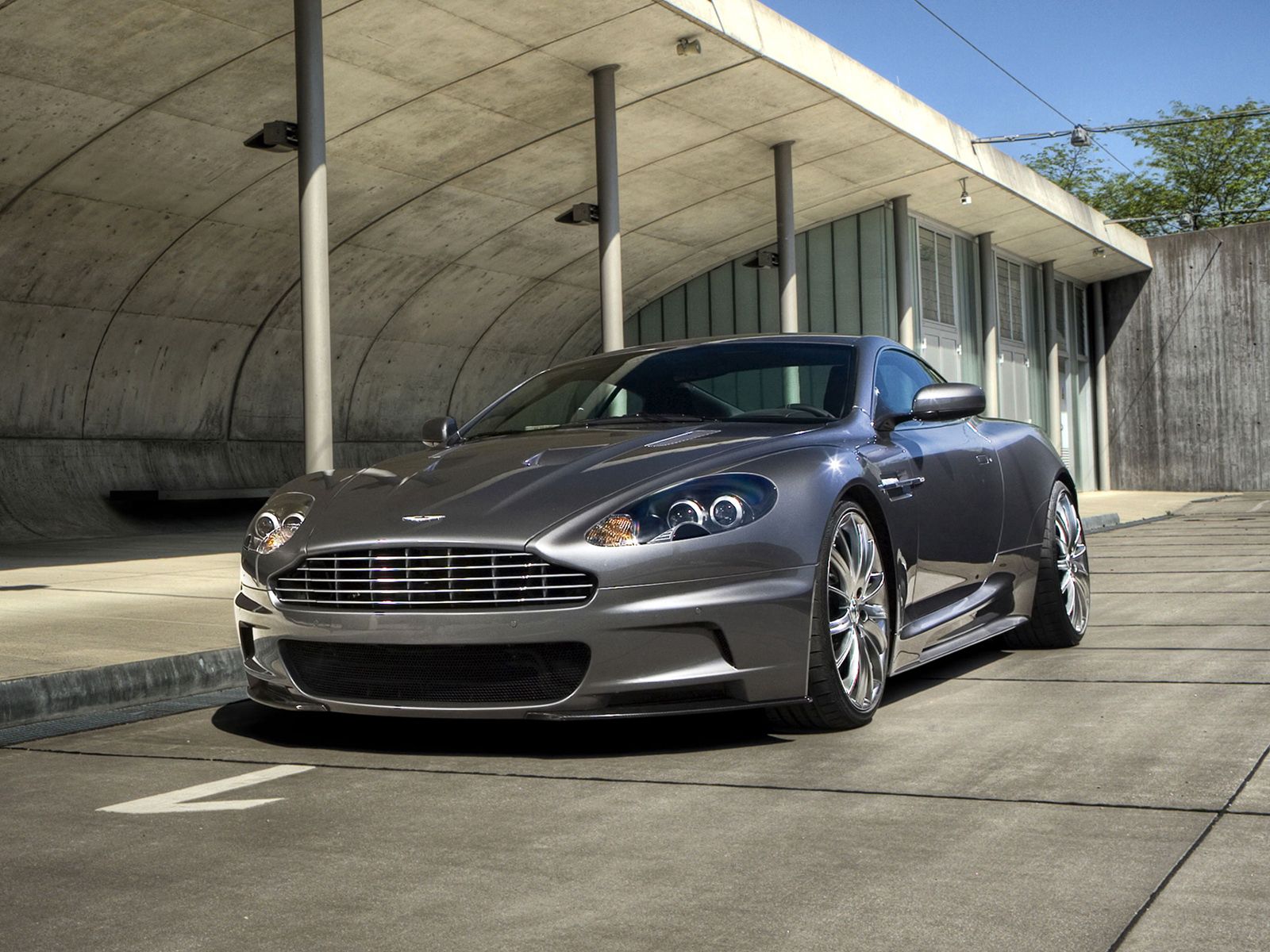 Download mobile wallpaper Dbs, 2009, Sky, Aston Martin, Grey, Front View, Auto, Cars for free.