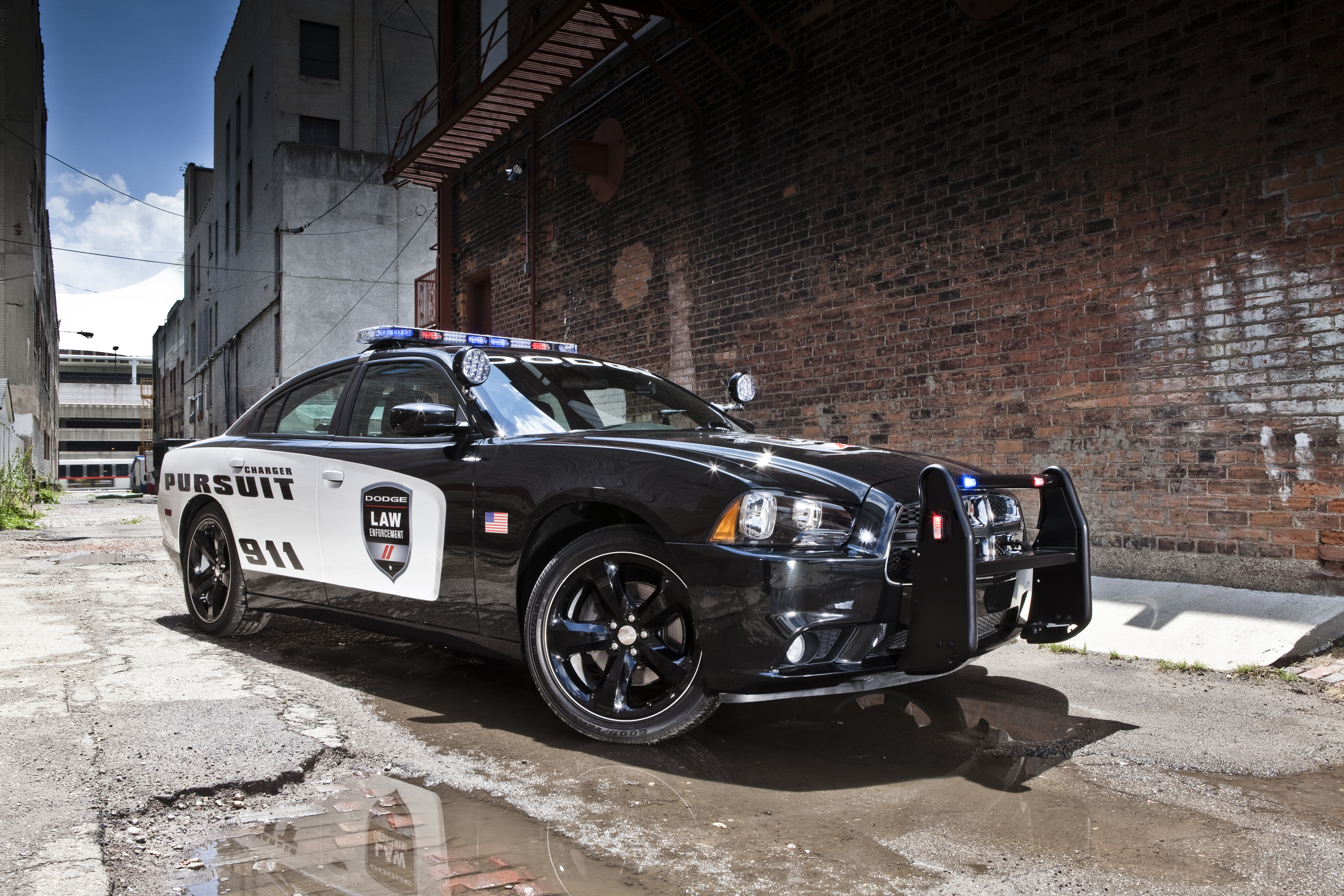 Обои полицейских машин. Dodge Charger Pursuit полиция. Dodge Charger полицейский. Додж Чарджер полиция. Додж Чарджер 2011 полиция.